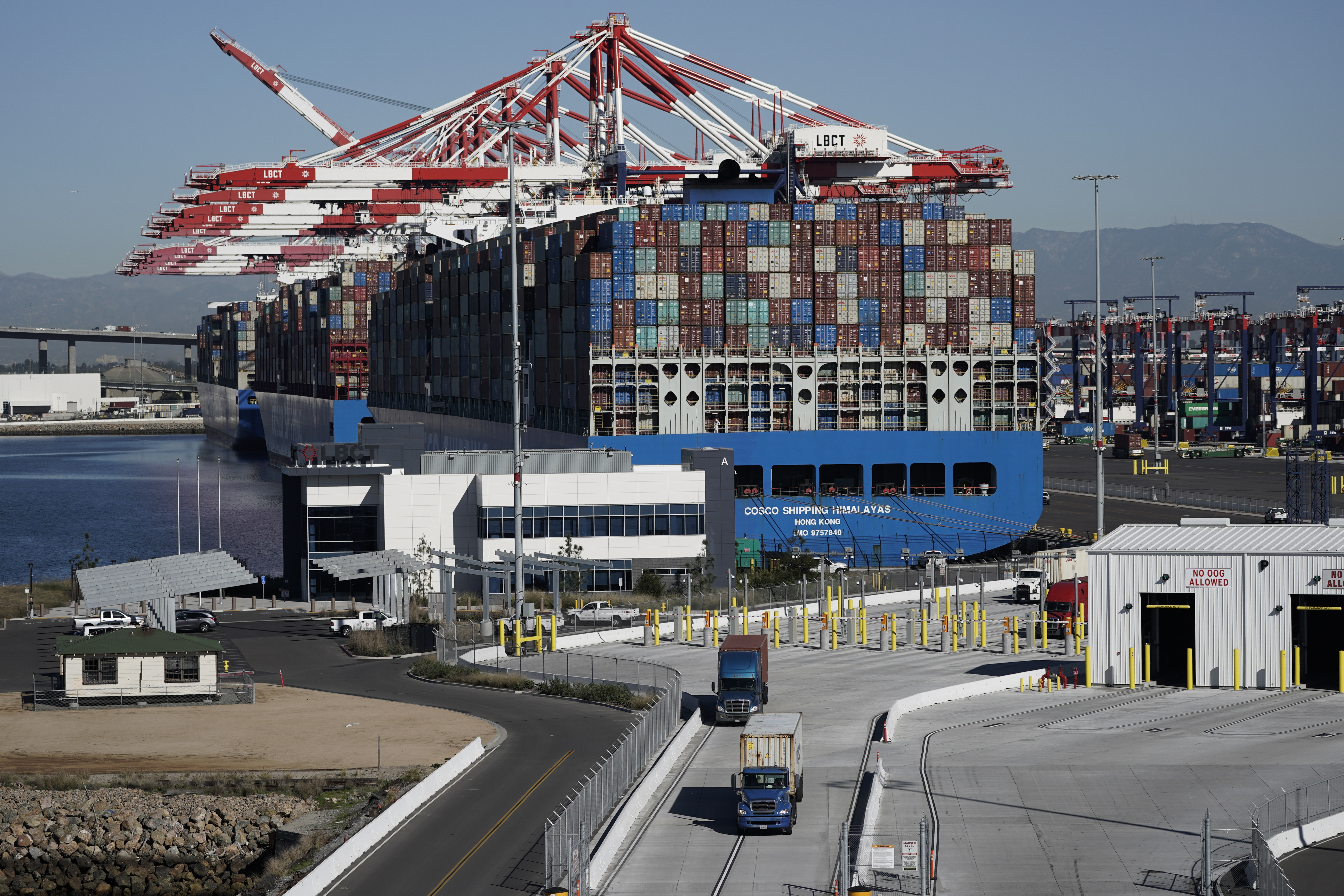 Container ships are docked at the Port of Long Beach in Long Beach, California