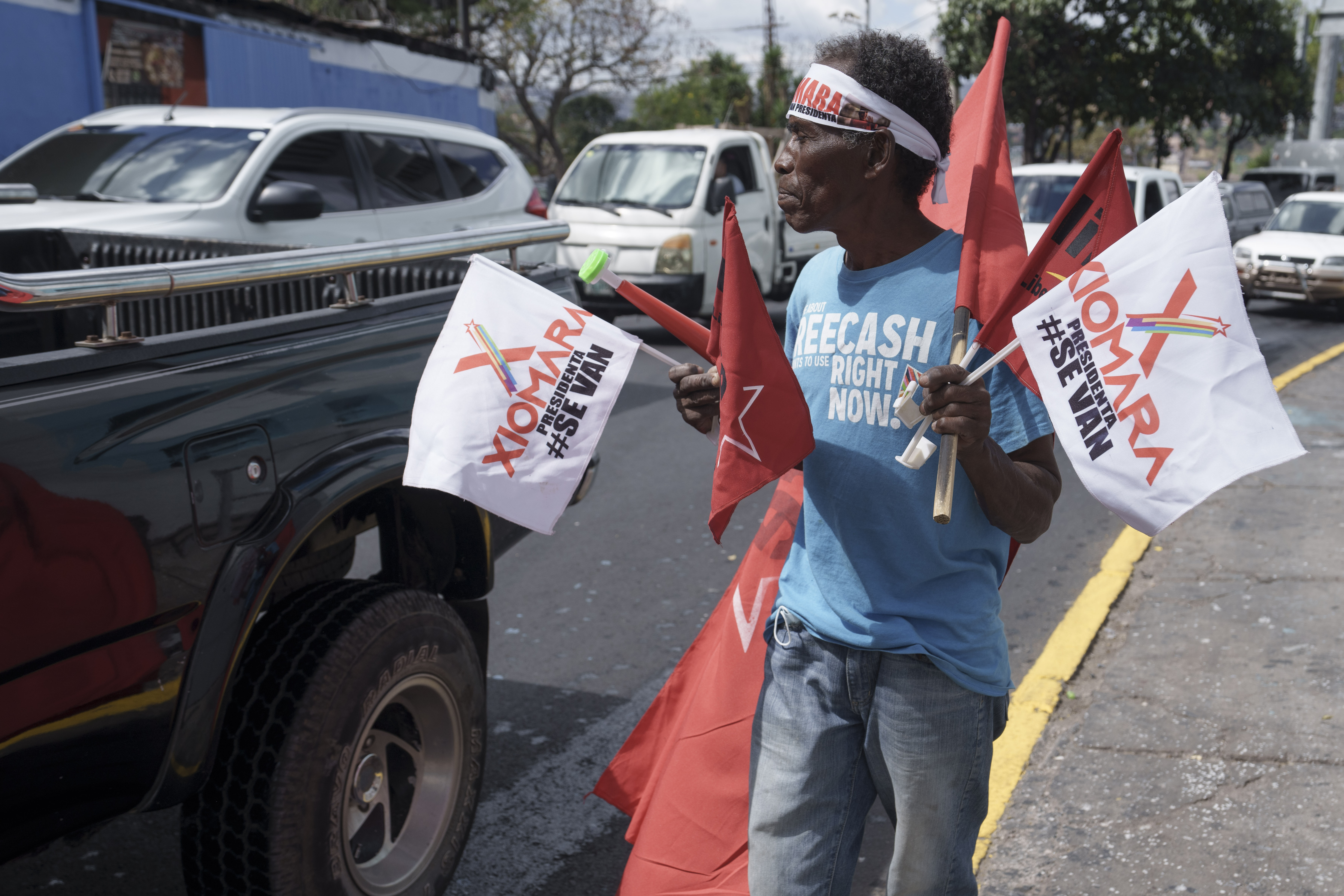 Street vendor hawking flags