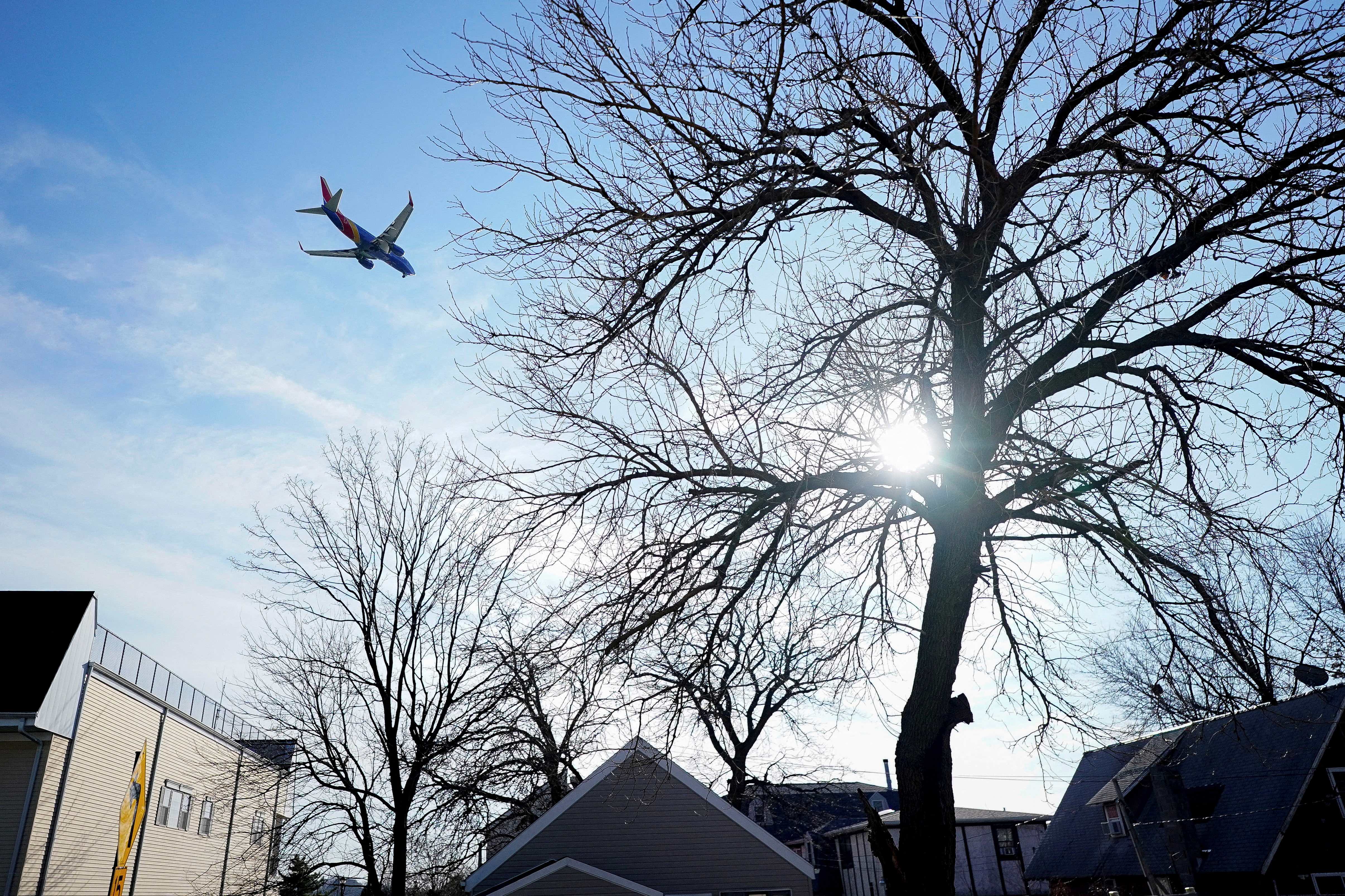 A Southwest Airlines flight, equipped with radar altimeters that may conflict with telecom 5G technology, flies 500 feet above the ground while on final approach to land at LaGuardia Airport in New York City, New York, United States