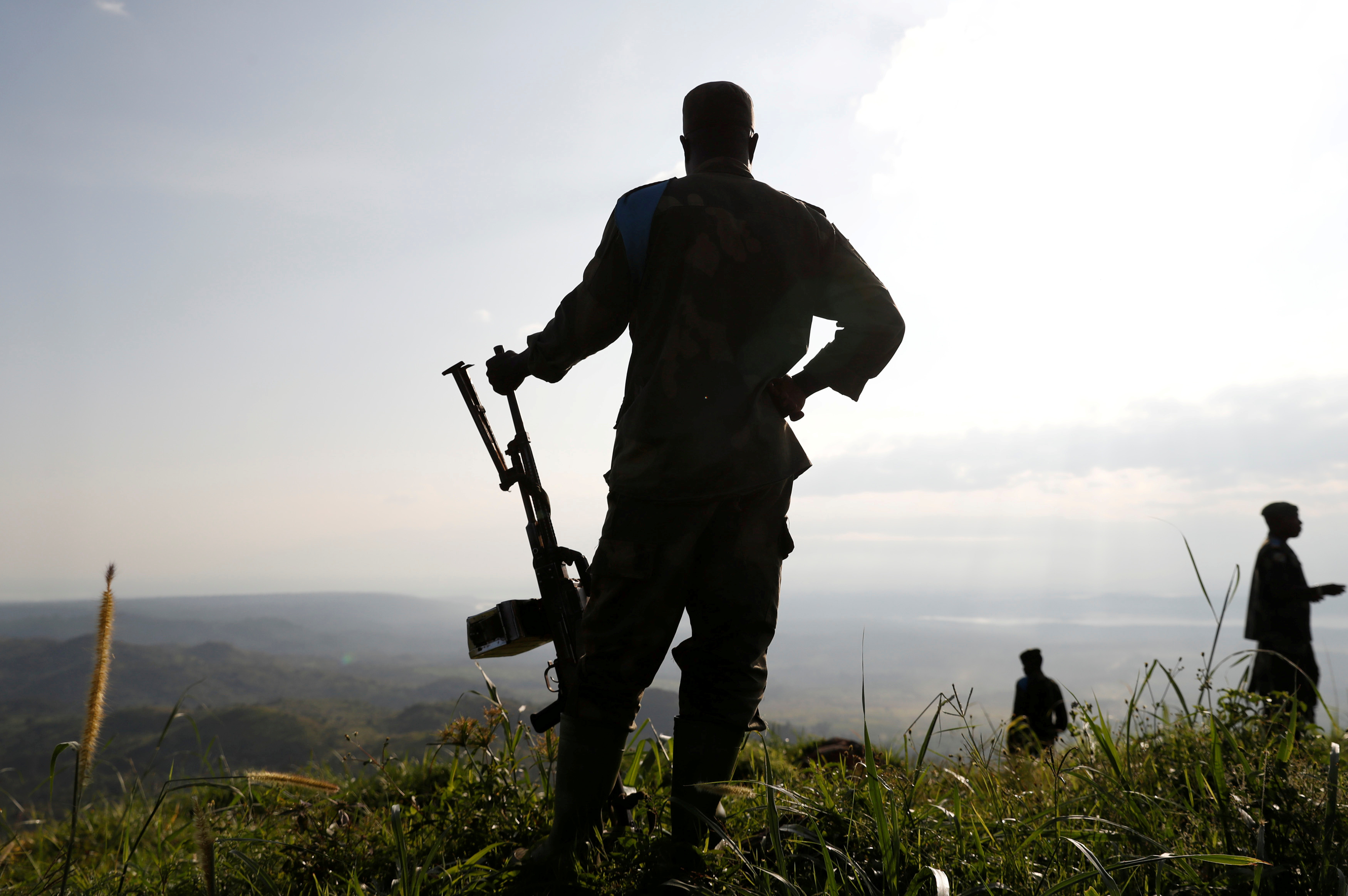 Congolese soldier standing with his gun