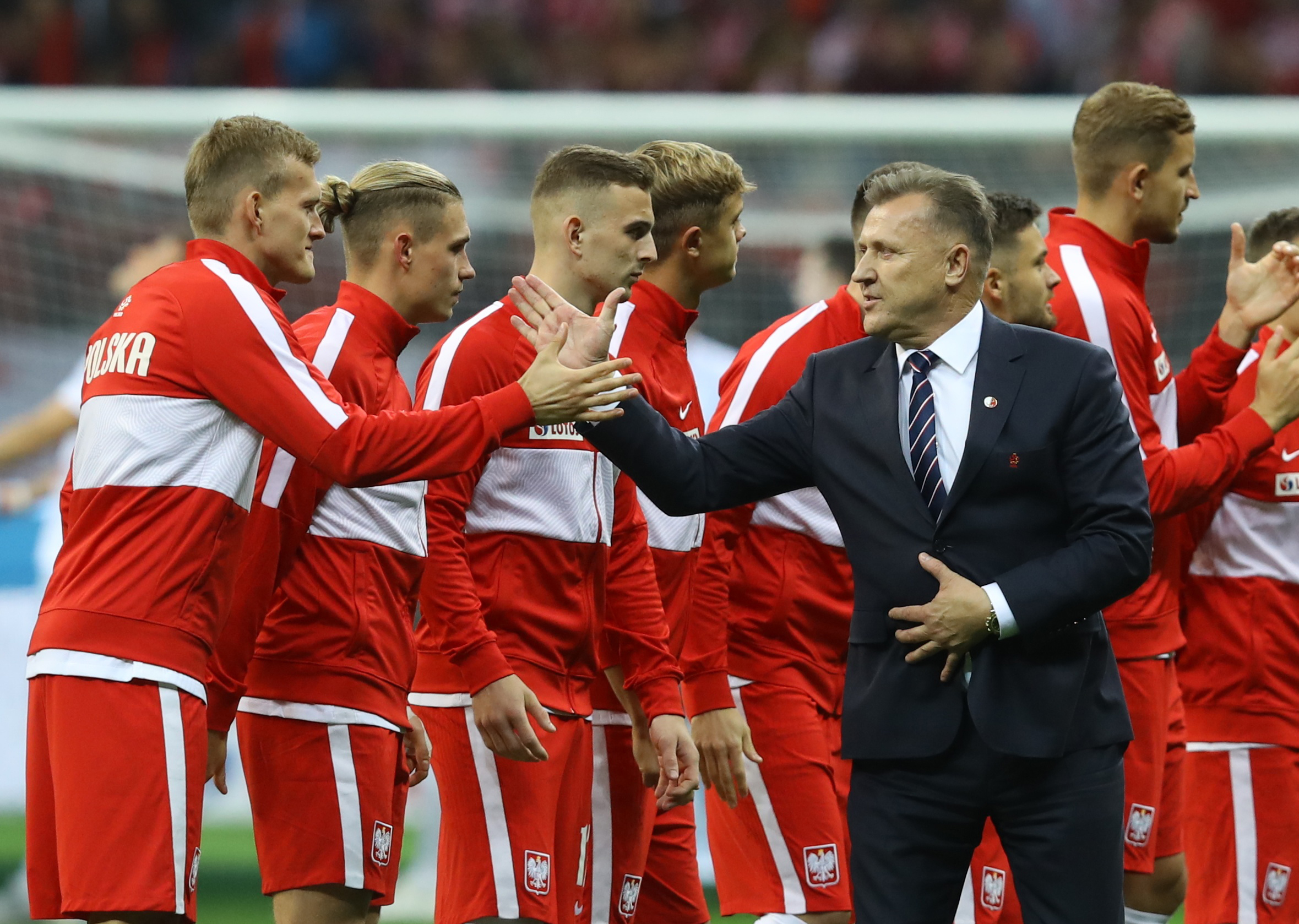 Poland players with president of the Polish Football Association Cezary Kulesza.