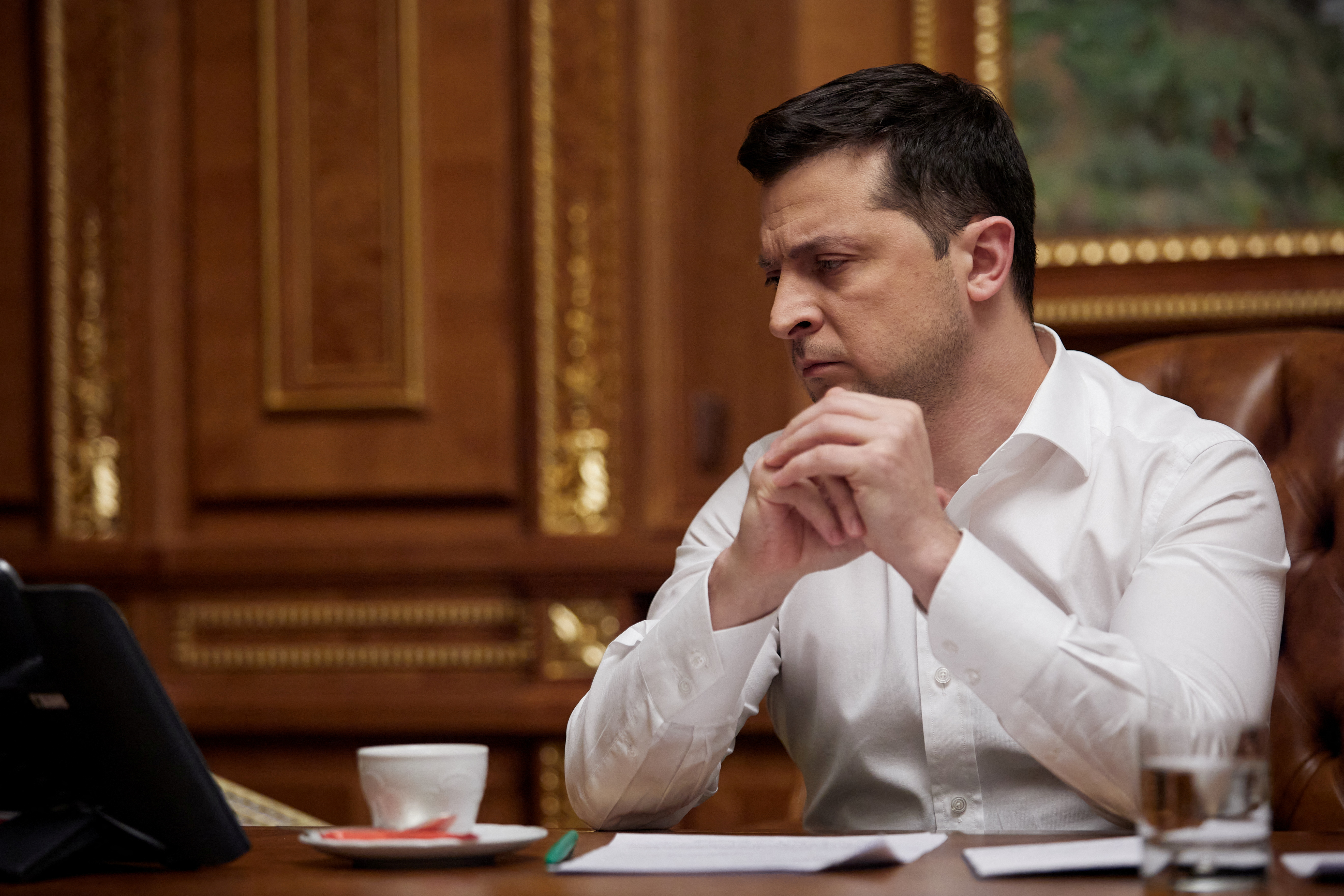 Ukraine's President Volodymyr Zelenskiy is seen during a call with US President Joe Biden in Kyiv,