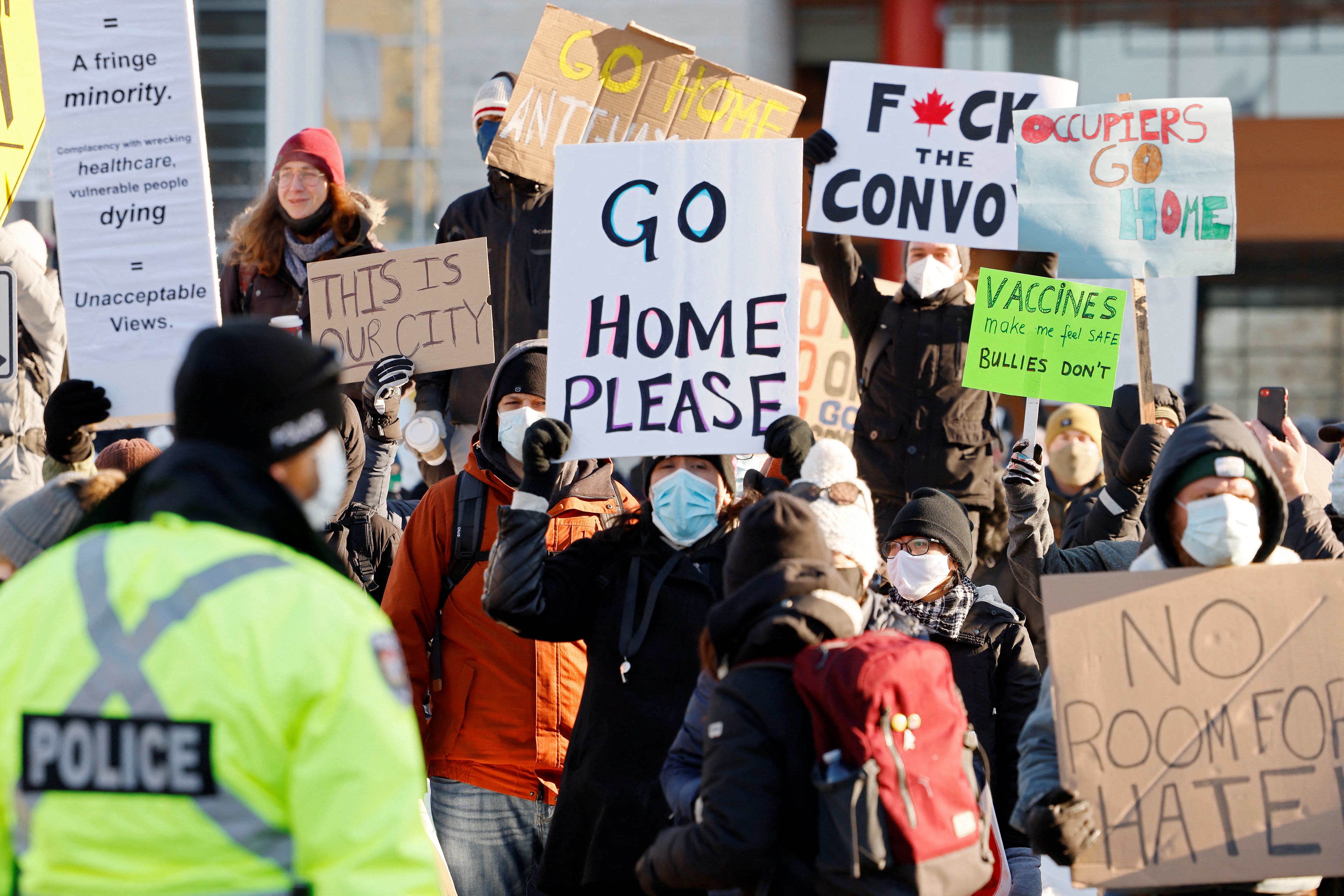 Demonstrators stage a counter-protest at City Hall as truckers and supporters continue to protest the coronavirus disease (COVID-19) vaccine mandates, in Ottawa, Ontario, Canada, February 5, 2022