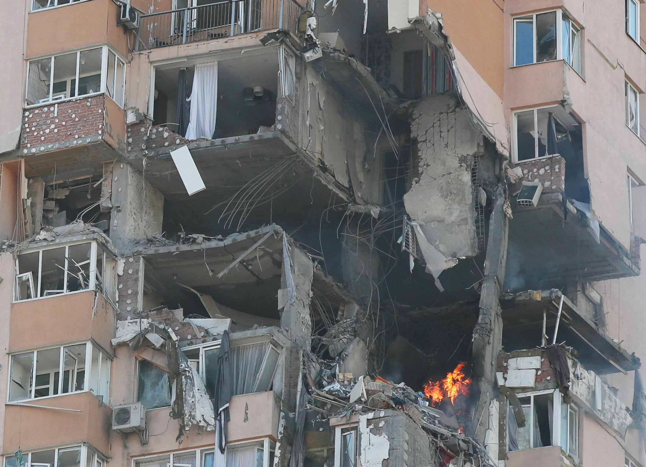 A view shows an apartment building damaged by recent shelling in Kyiv