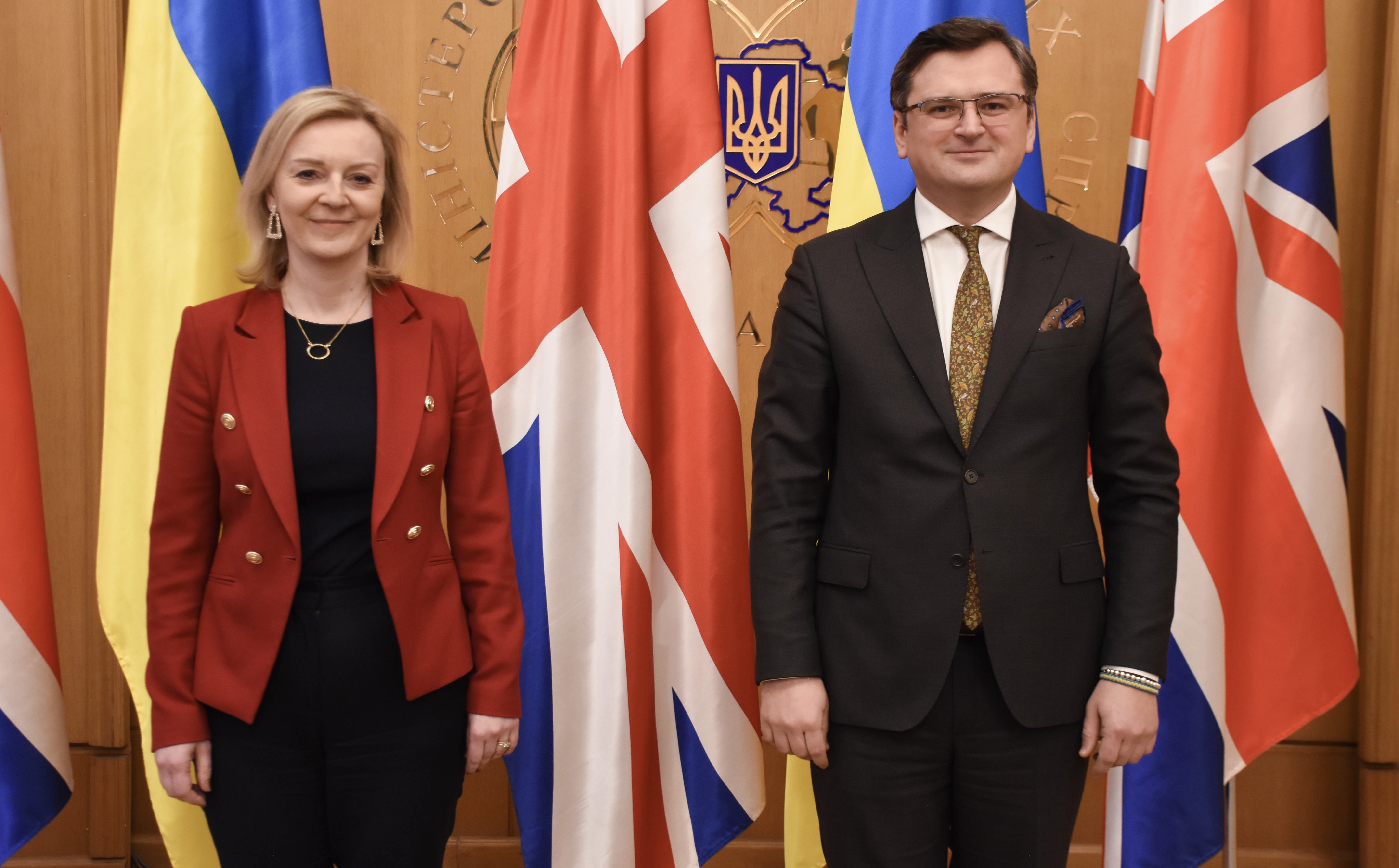 UK Foreign Secretary Liz Truss and Ukrainian Minister of Foreign Affairs Dmytro are seen standing side by side Kuleba 