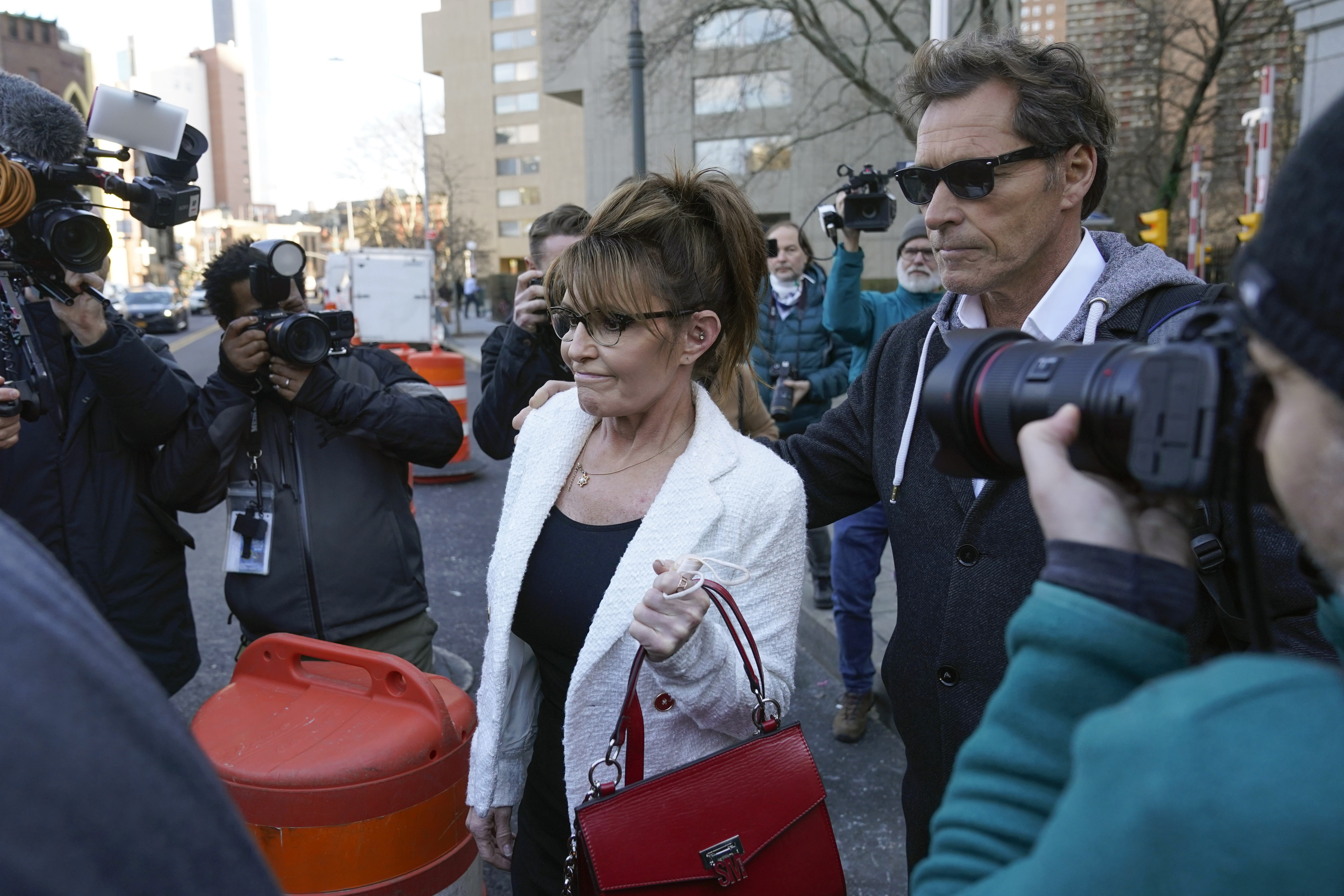 Sarah Palin leaves the courtroom