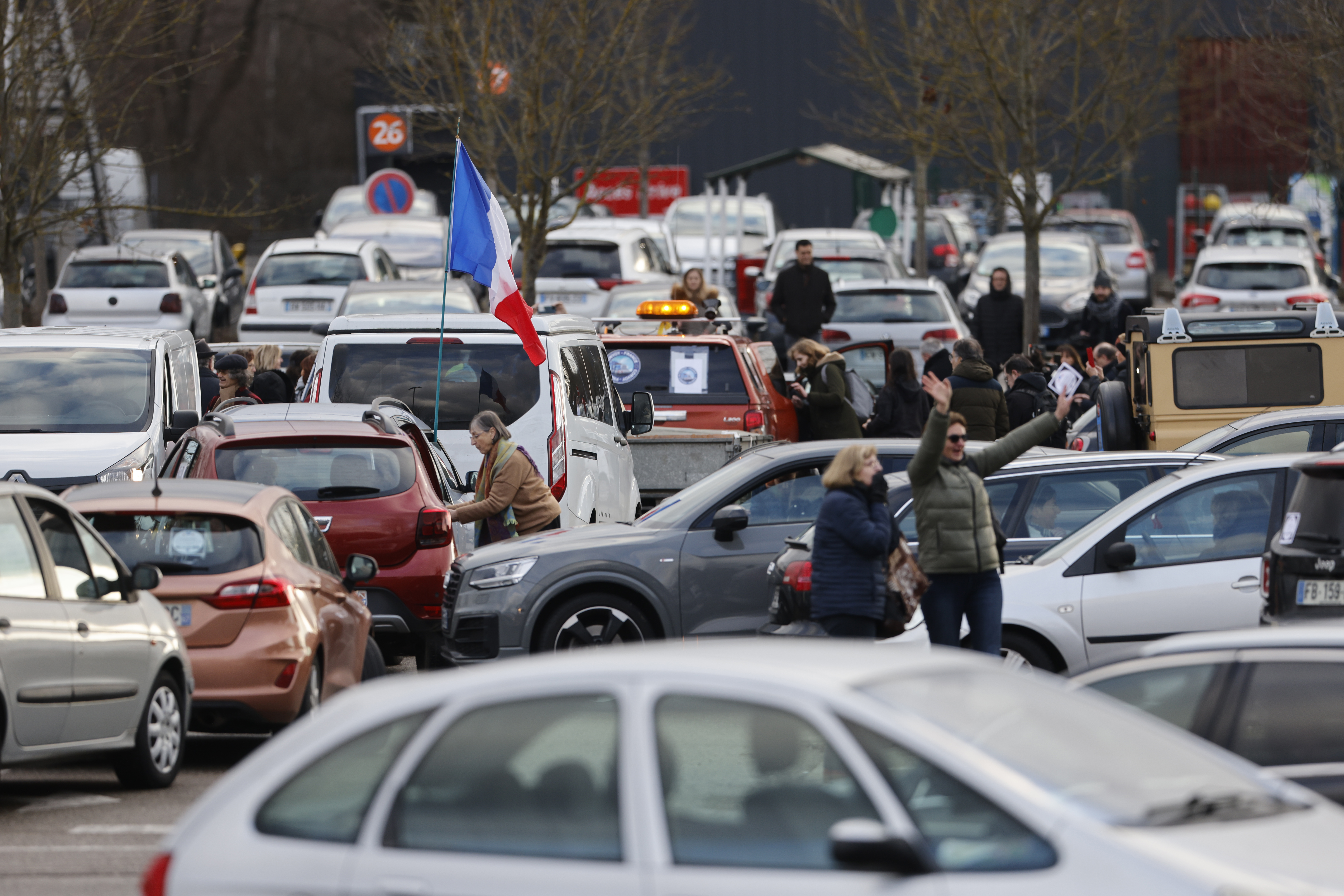 Protesters are seen gathering for a convoy before heading to Paris
