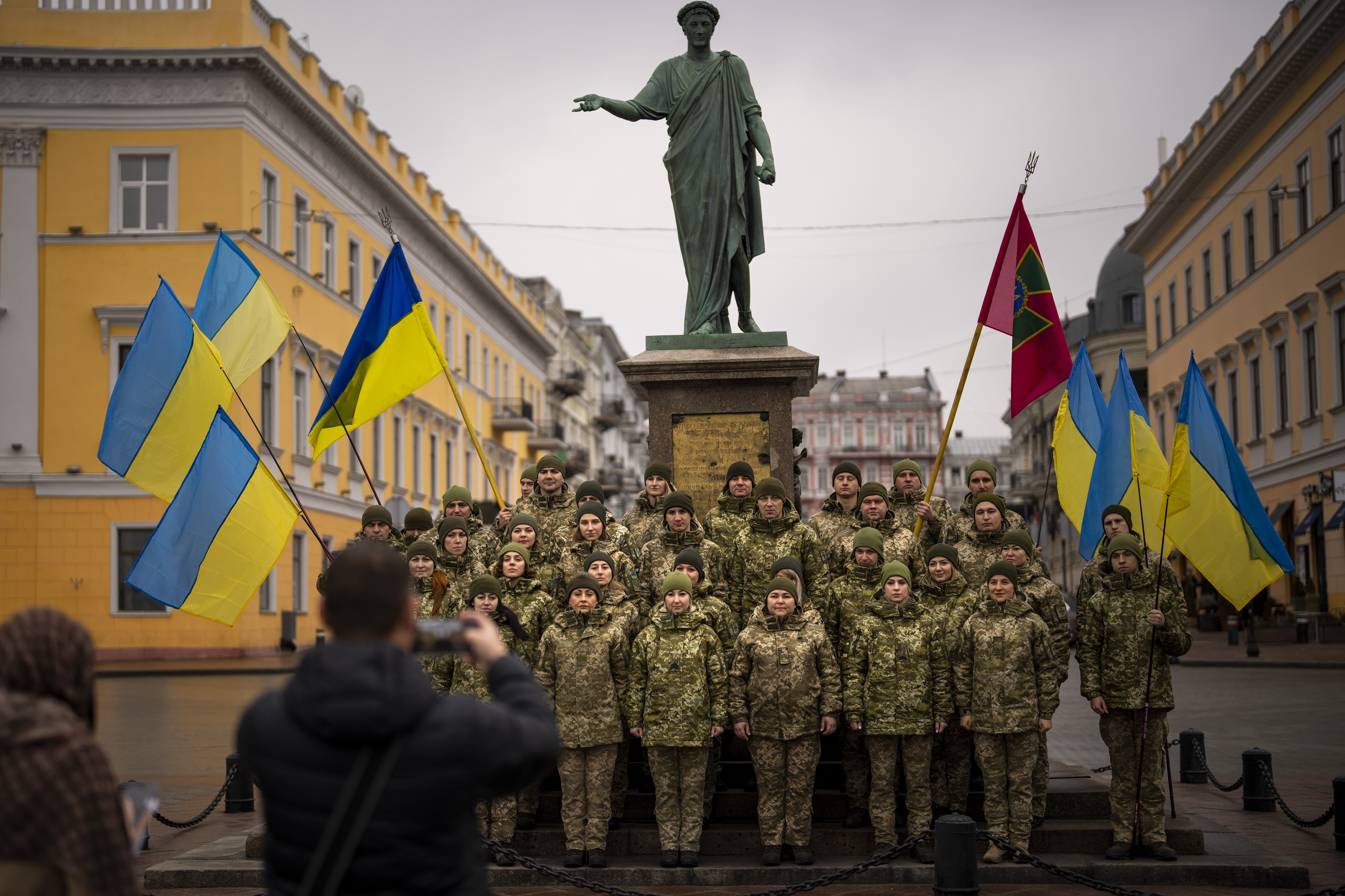 Ukrainian Army soldiers pose for a photo as they gather to celebrate a Day of Unity in Odessa, Ukraine
