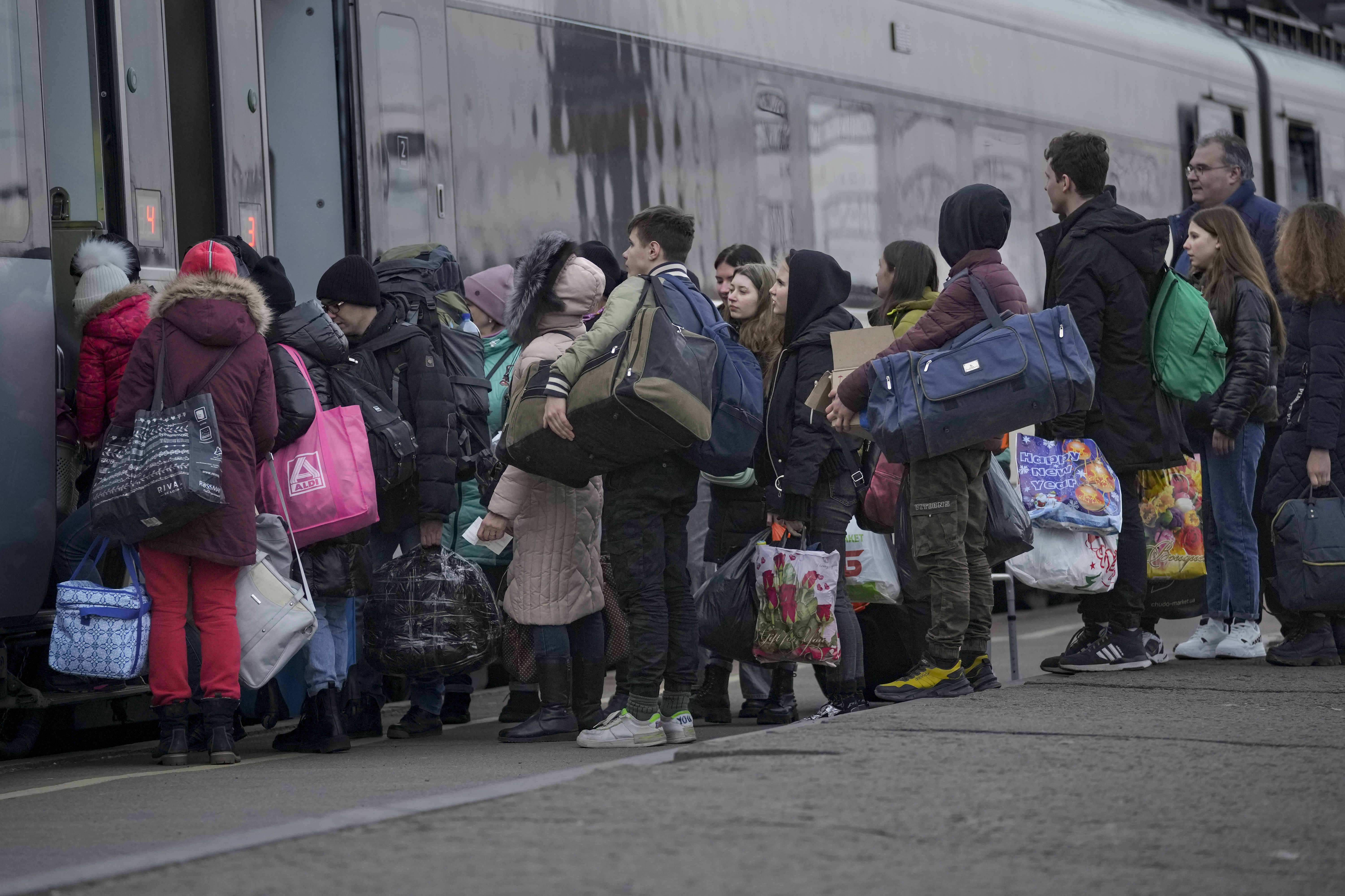 People board a Kyiv bound train on a platform in Kramatorsk, the Donetsk region, Ukraine.