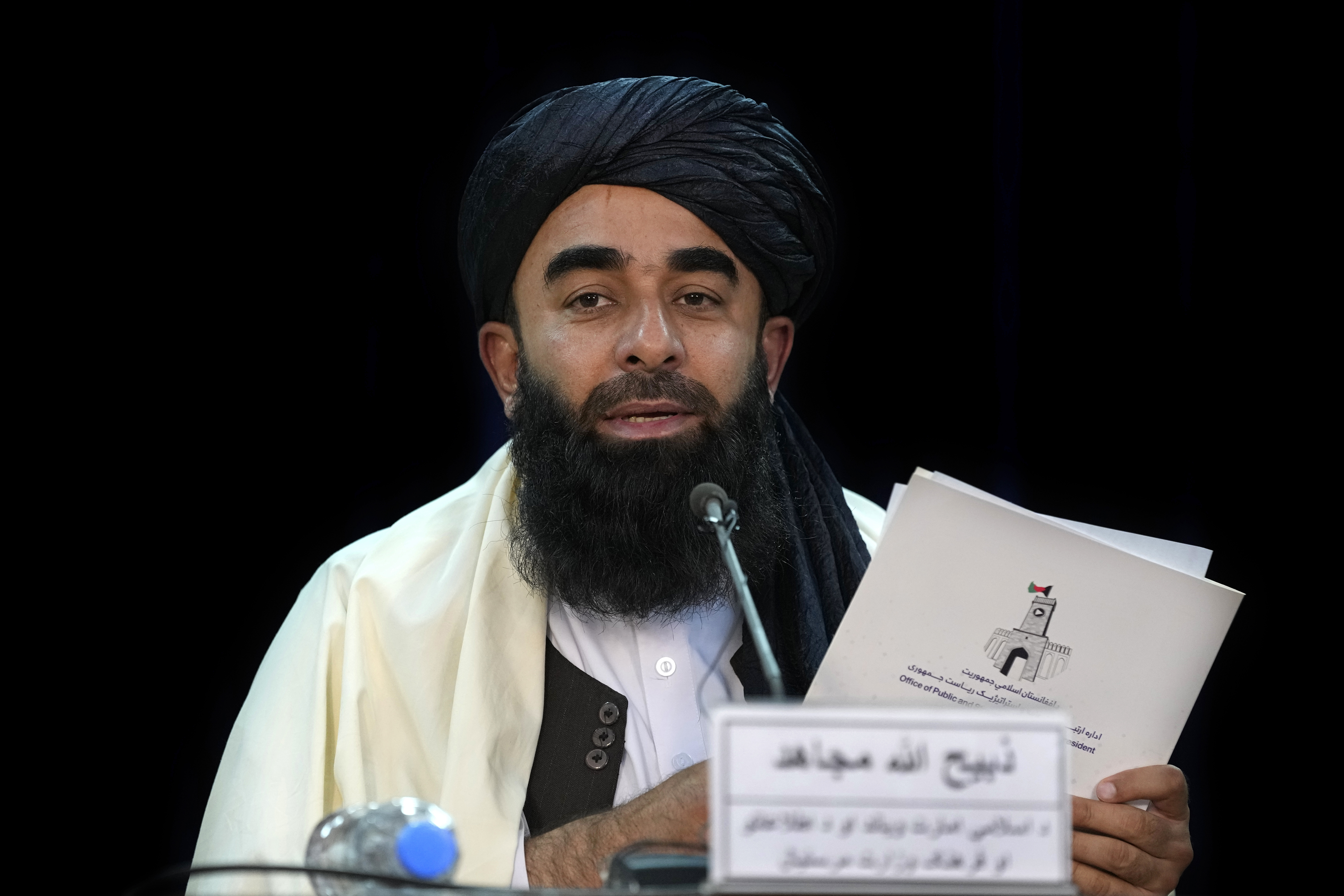 Taliban spokesman Zabihullah Mujahid addresses a press conference