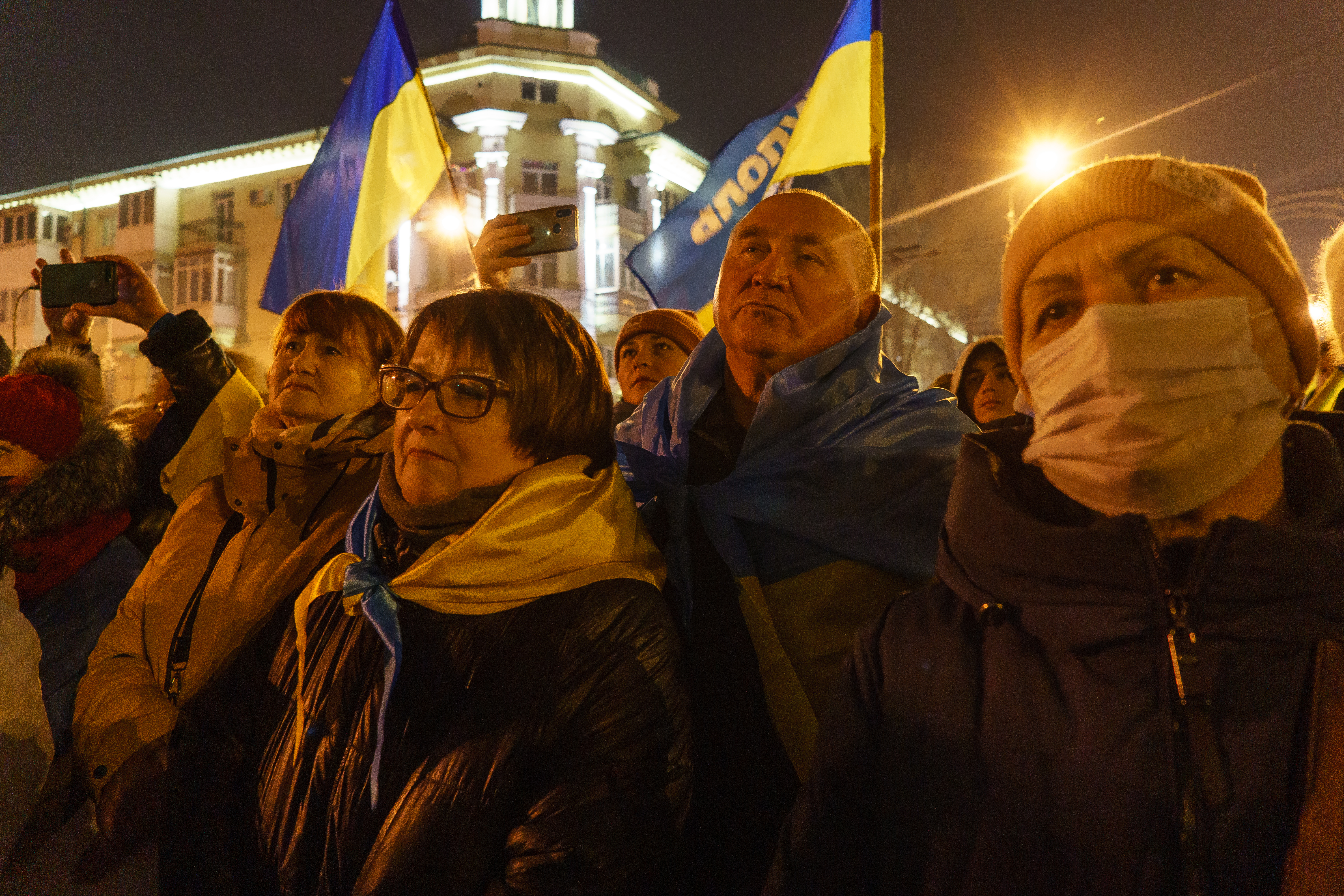 People protesting in front of Donetsk Regional Theatre of Drama in Mariupol, Ukraine