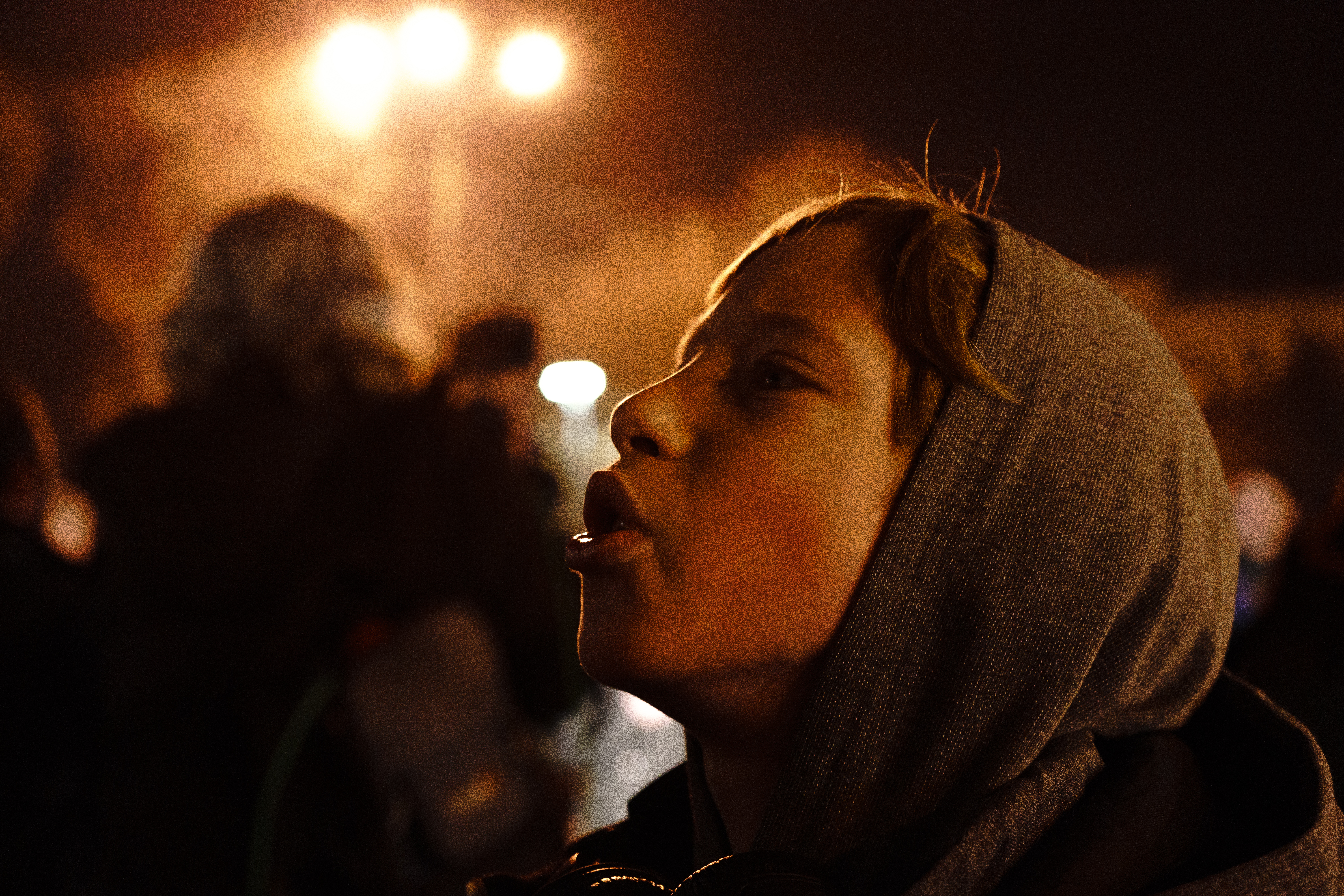 Young Ukrainian boy singing the national anthem on Feb 22, in Theater Square, Mariupol