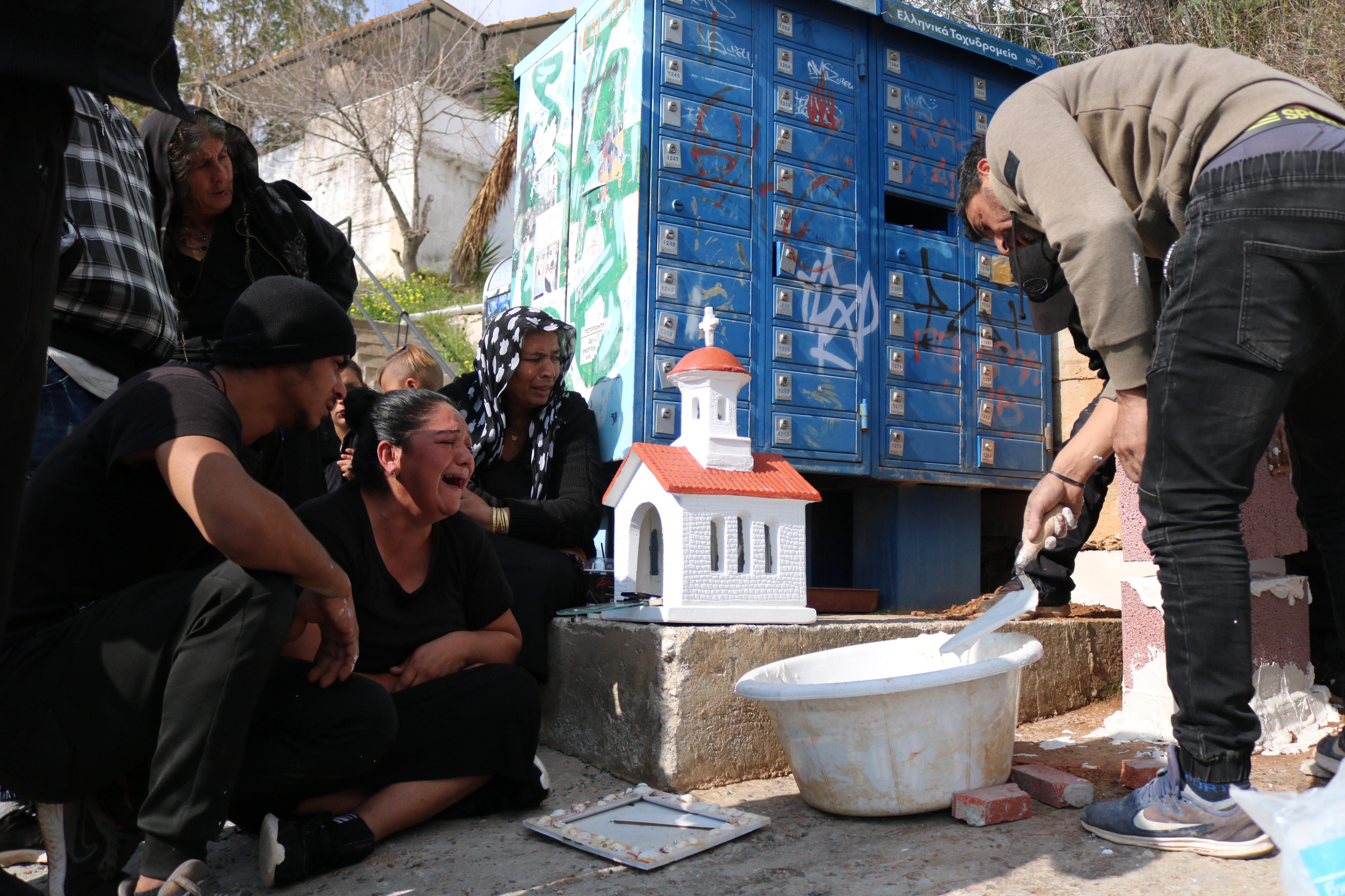 A family of victim of police shooting builds a memorial in Greece