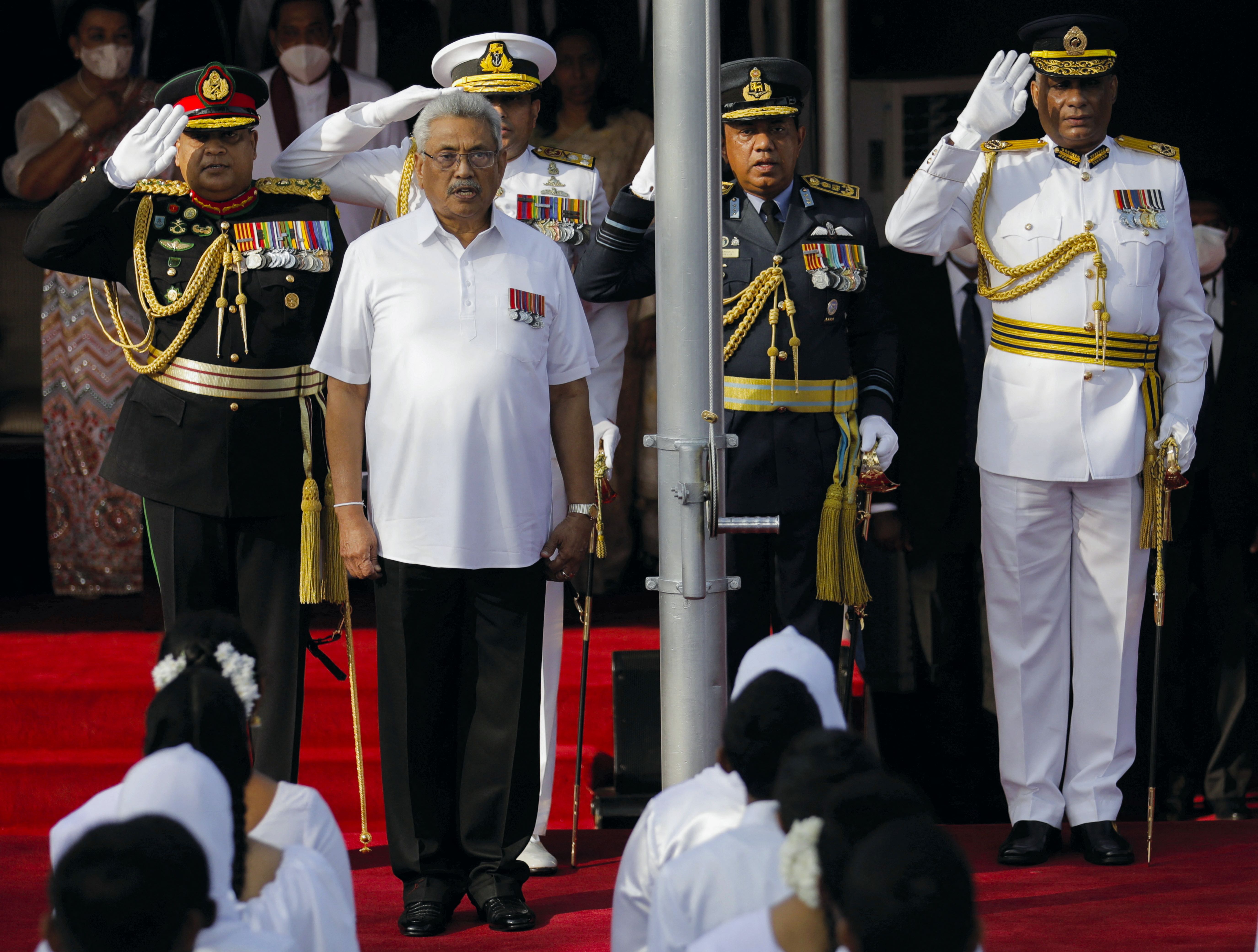 Sri Lanka's President Gotabaya Rajapaksa sings the national anthem during the country's 74th Independence Day celebrations