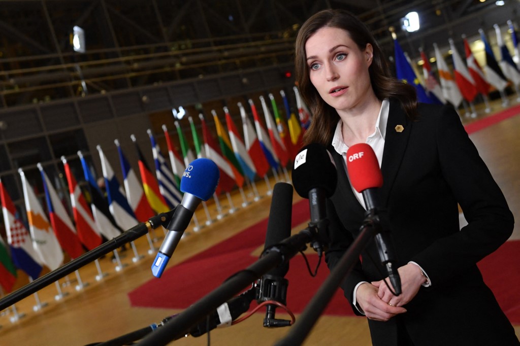 Finland's Prime Minister Sanna Marin speaks to press