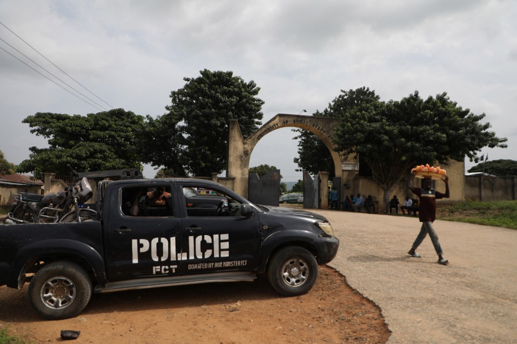 A police truck is stationed outside the University of Abuja Staff Quarters gate where unknown gunmen kidnapped people on November 2, 2021 - [File: Kola Sulaimon/AFP]