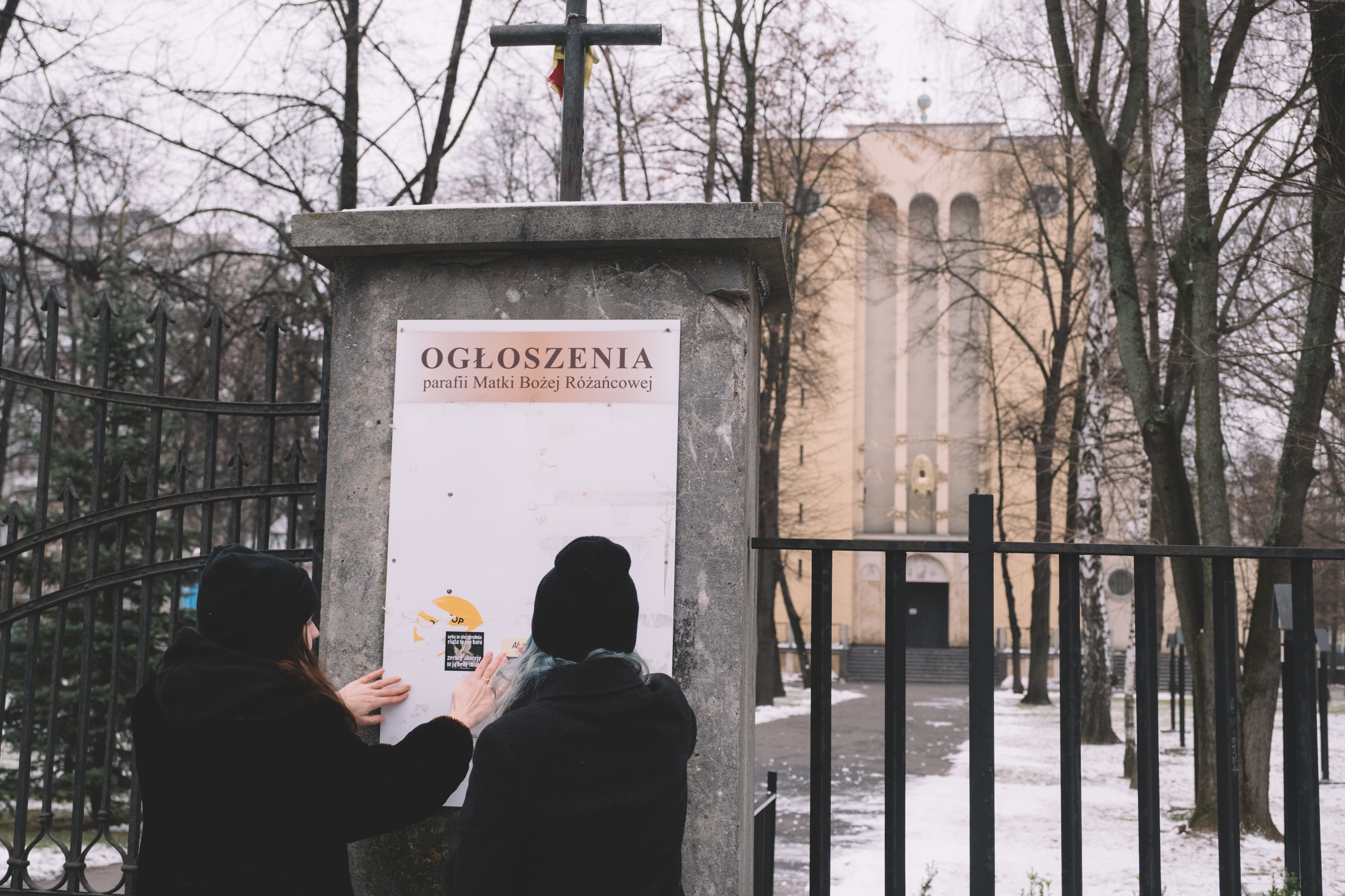 A pro abortion sticker is attached at the entrance of a church yard. Church has always been very critical towards abortion, admitting it only in extremely rare cases