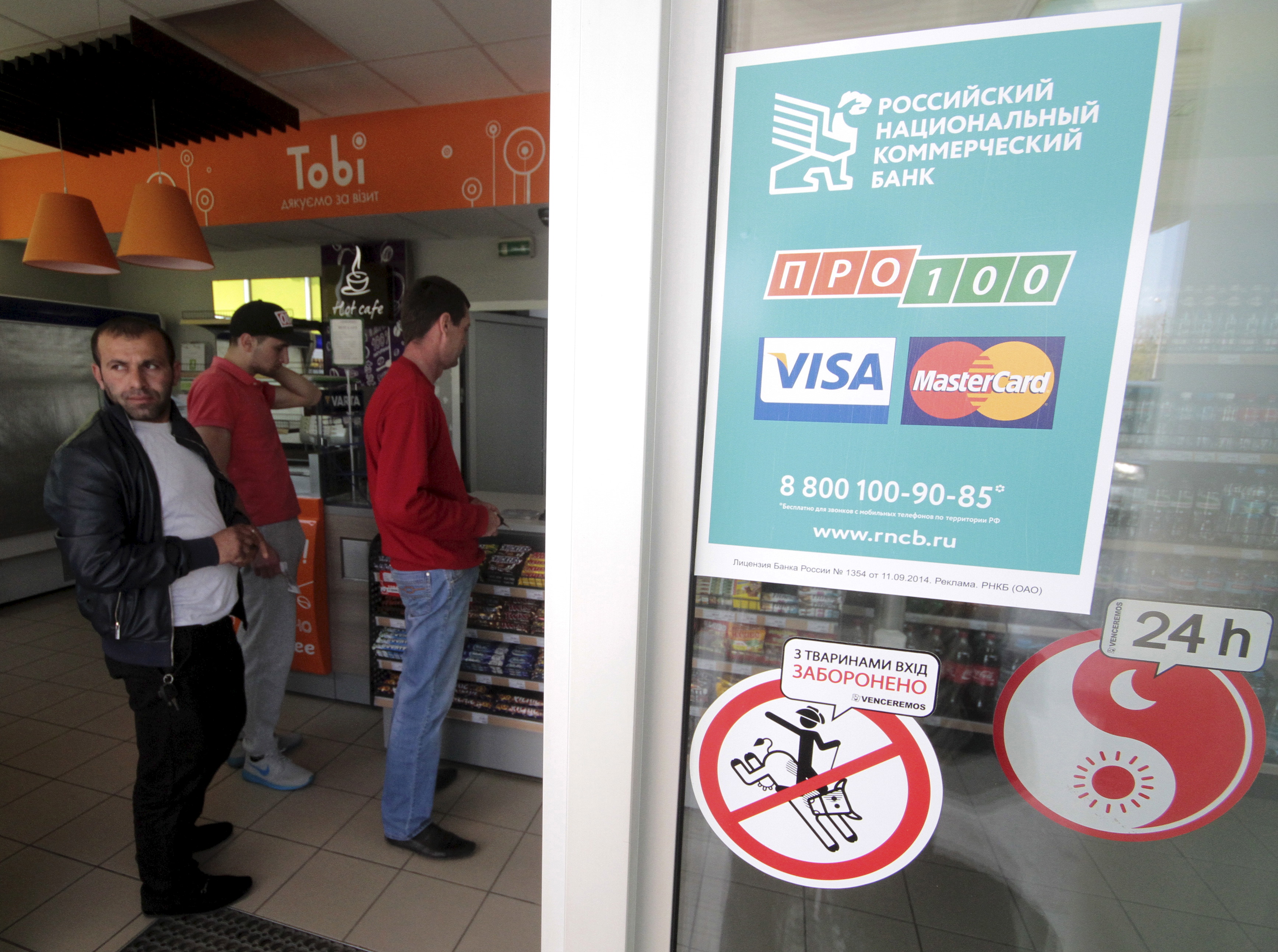 Visa and Mastercard had already announced that they were complying with US and international sanctions imposed on Russia in the wake of its attack [File: Pavel Rebrov/Reuters]