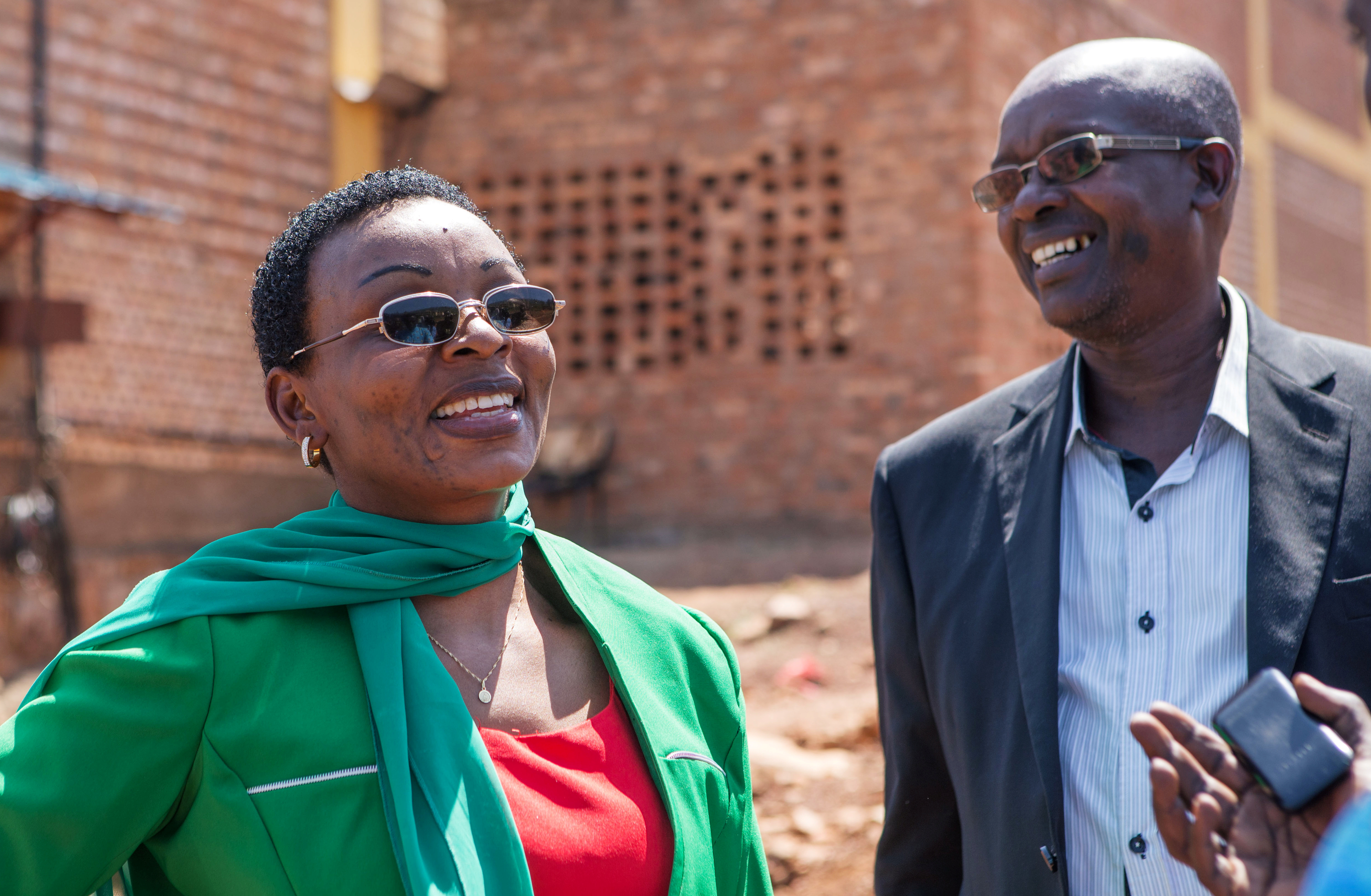 Rwandan politician of the unregistered FDU-Inkingi opposition party, Victoire Ingabire (L), and lawyer Gatera Gashabana are seen at the Mageragere Prison in Kigali, Rwanda September