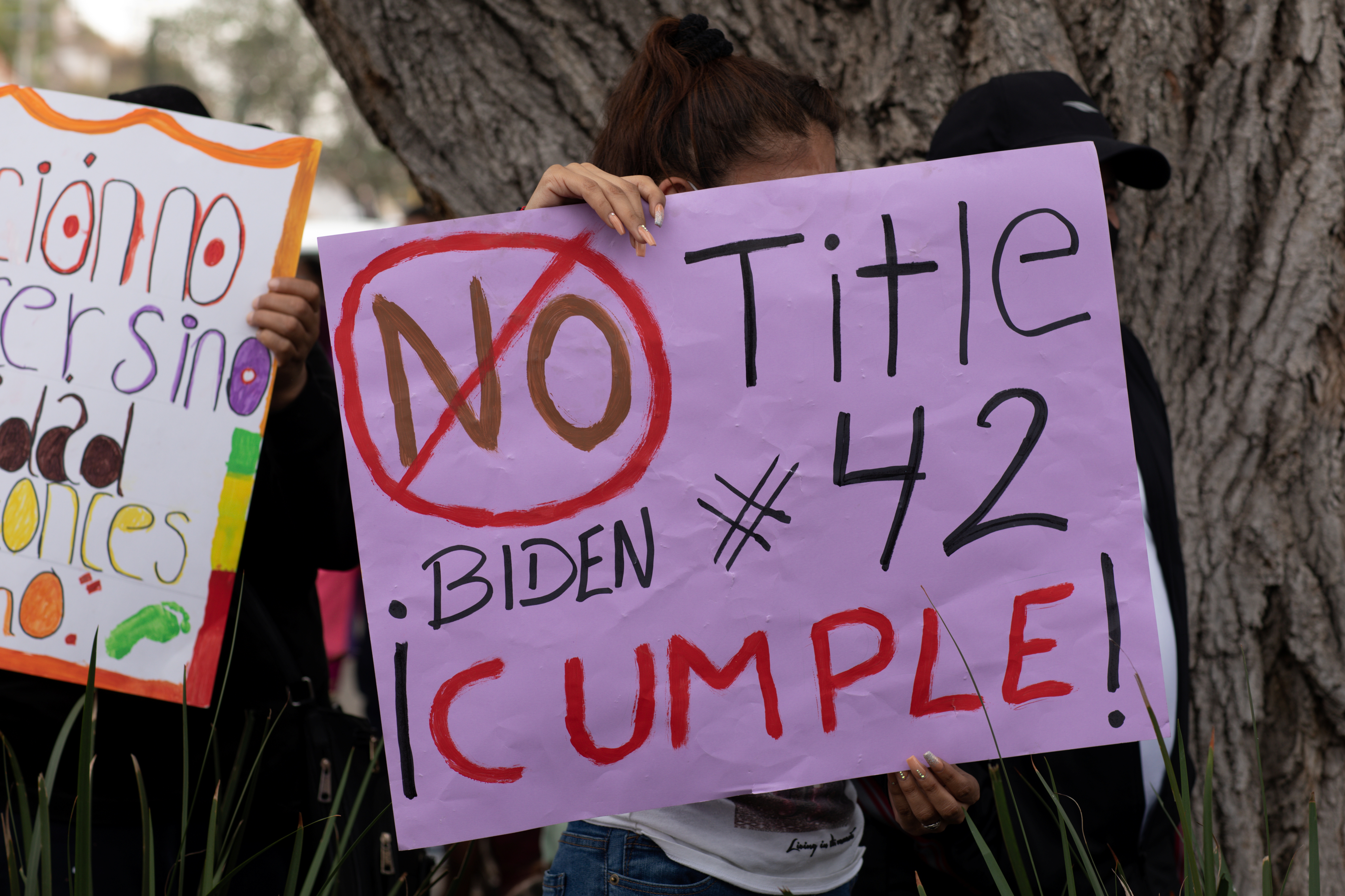 Sign saying no to Title 42 expulsions