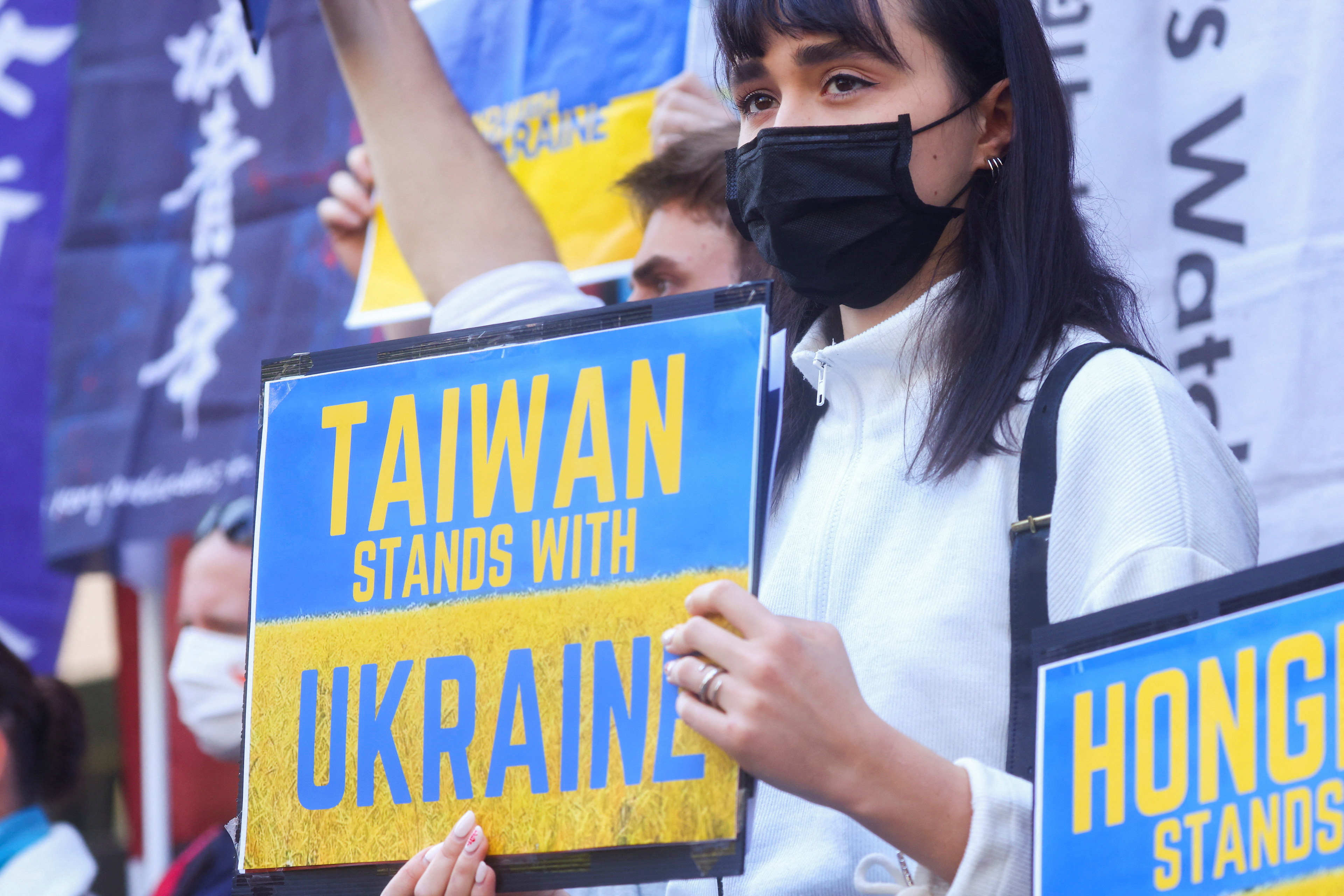 Woman holding sign during protest