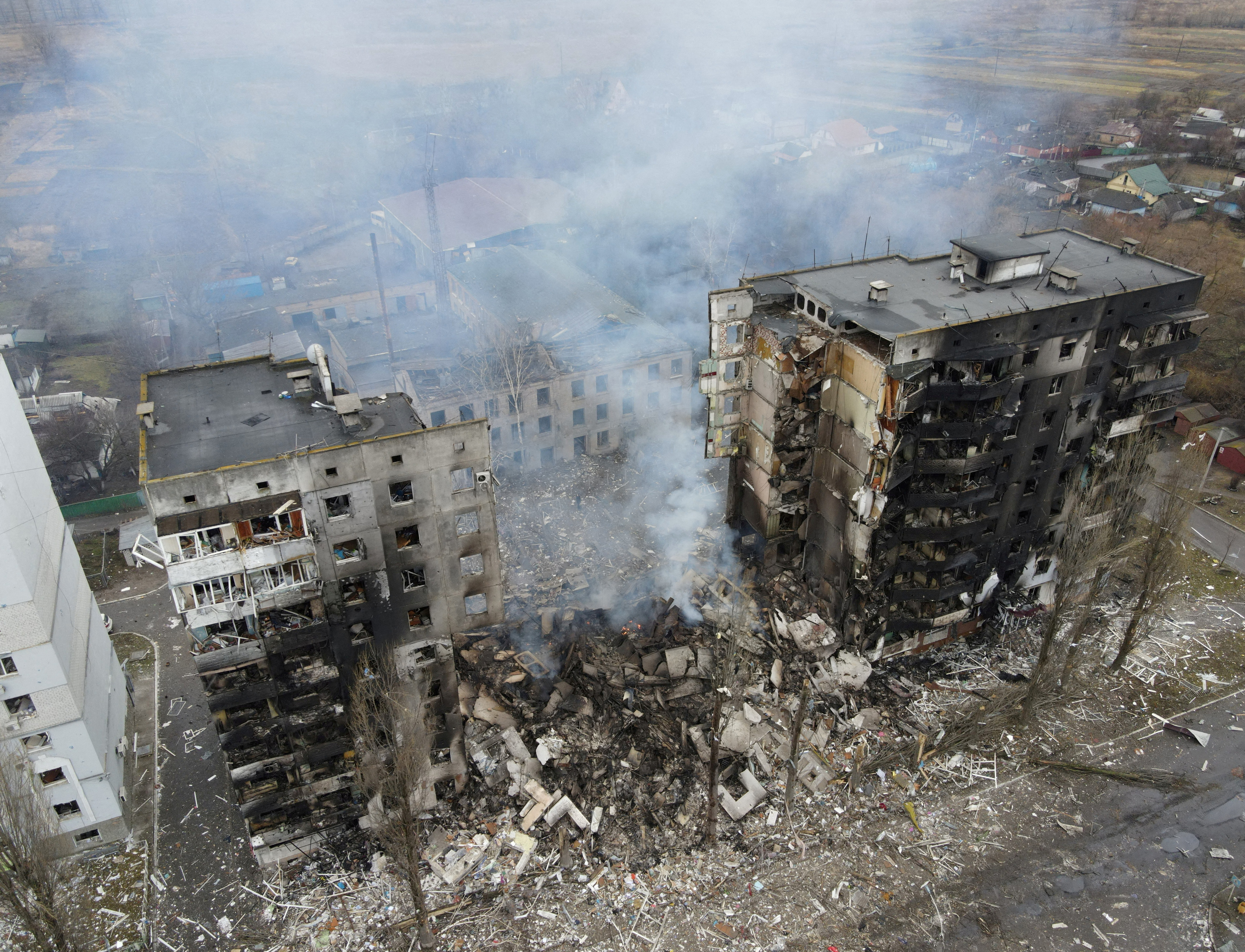 An aerial view shows a residential building destroyed by shelling in the Kyiv region