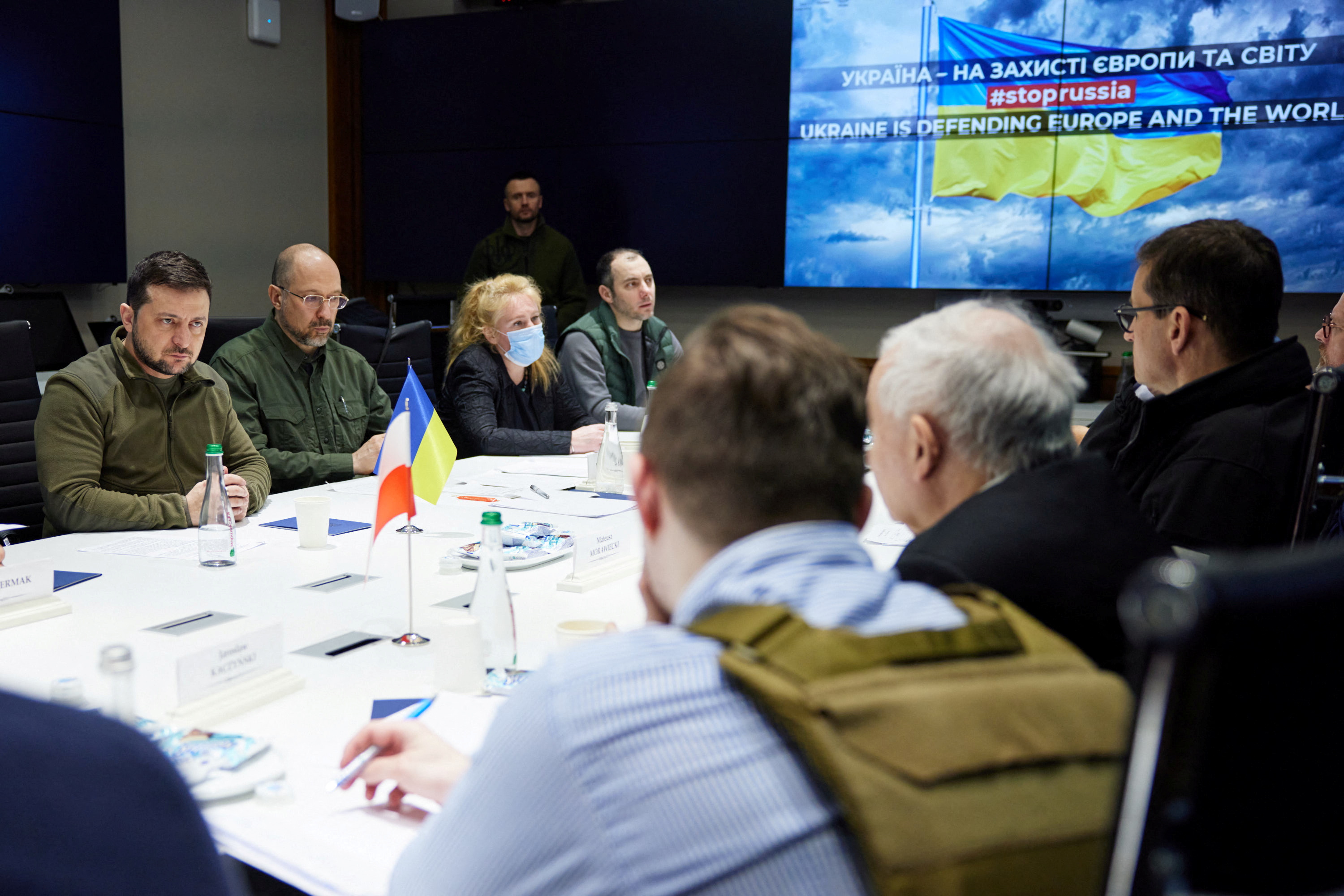 Ukraine's President Volodymyr Zelenskiy and Prime Minister Denys Shmygal attend a meeting with Czech Prime Minister Petr Fiala, Slovenia's Prime Minister Janez Jansa, Polish Prime Minister Mateusz Morawiecki and Deputy Prime Minister Jaroslaw Kaczynski in Kyiv, Ukraine March 15, 2022.