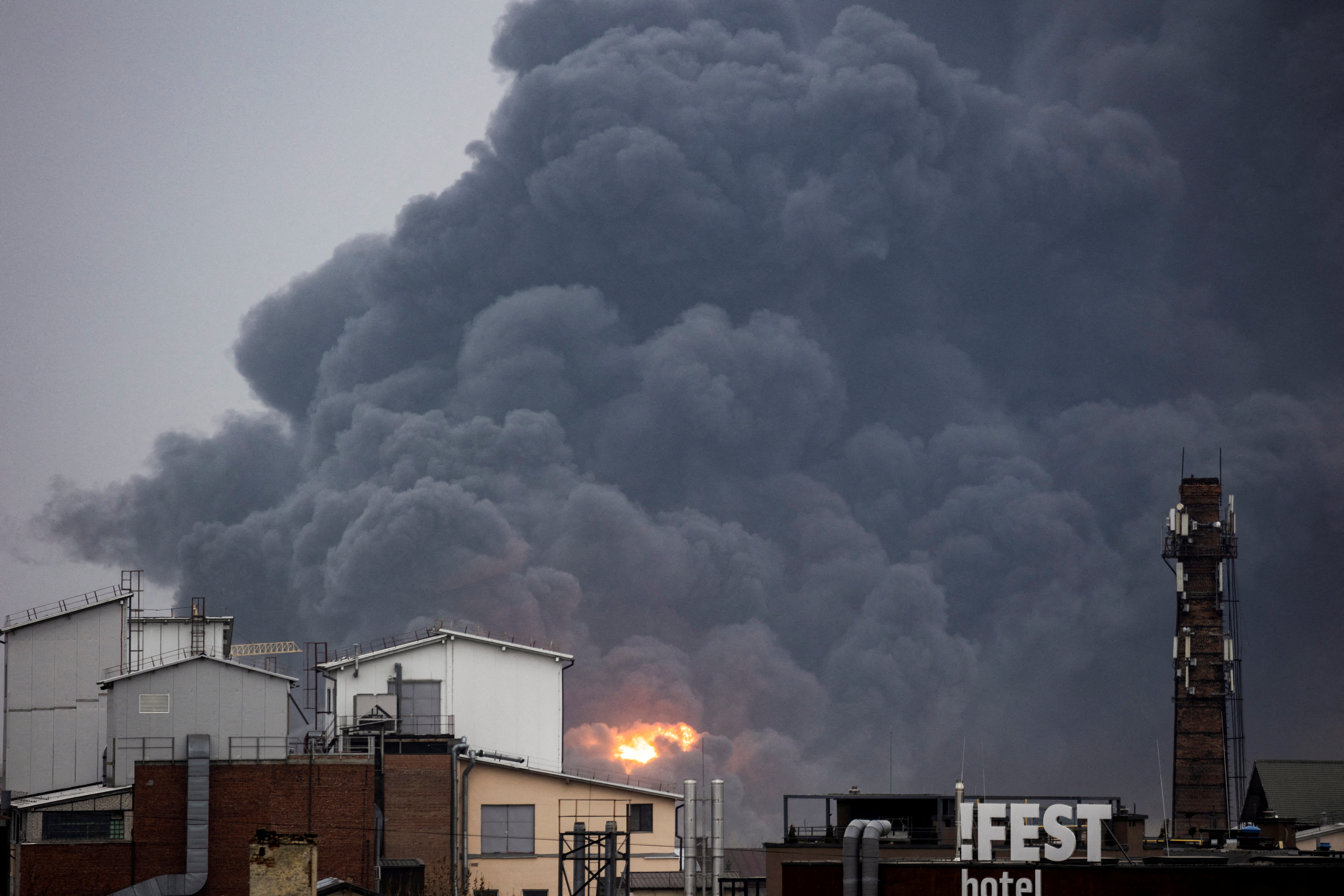Smoke rises after an air raid, as Russia's attack on Ukraine continues, in Lviv.