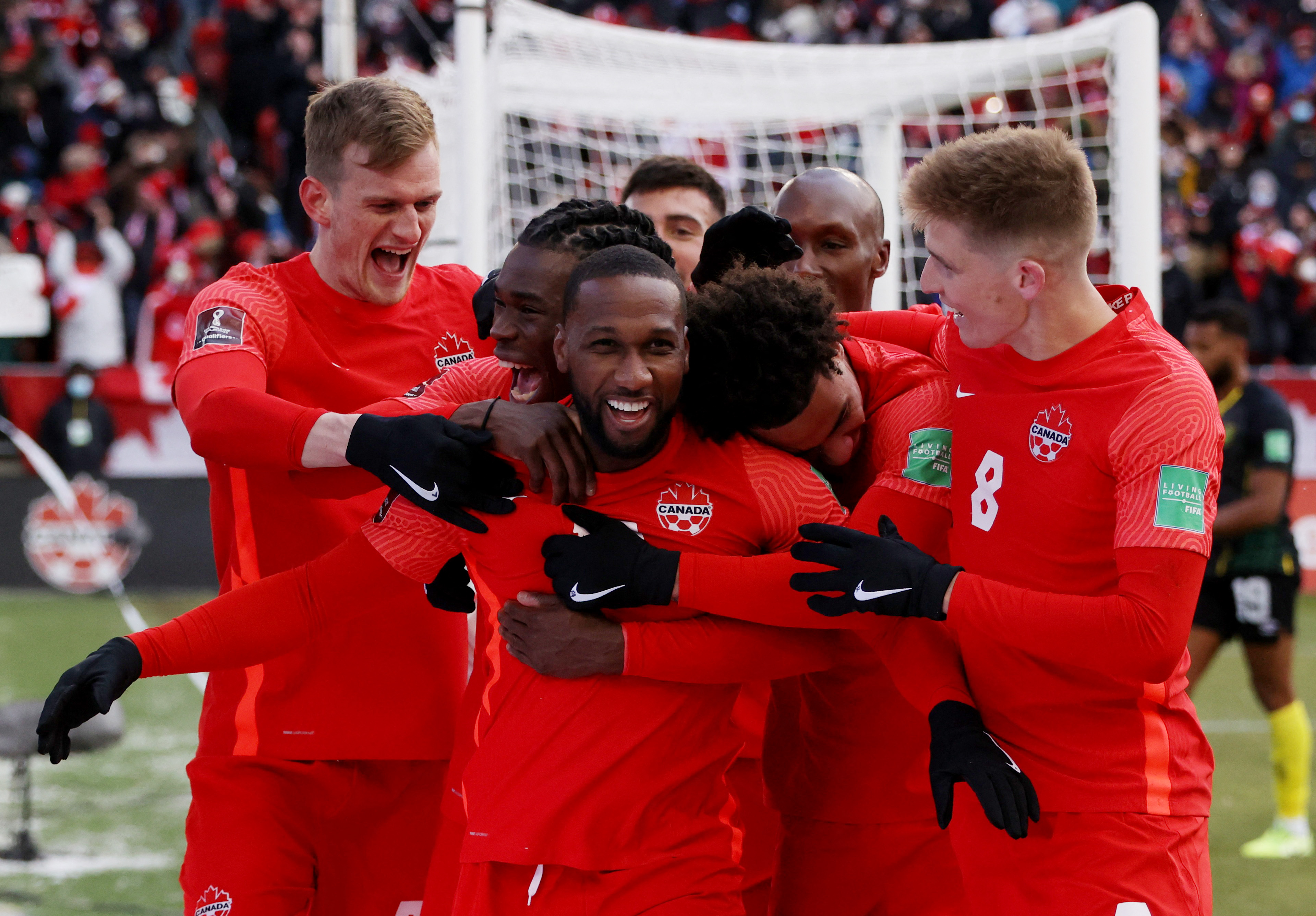 Canadian players in red celebrating