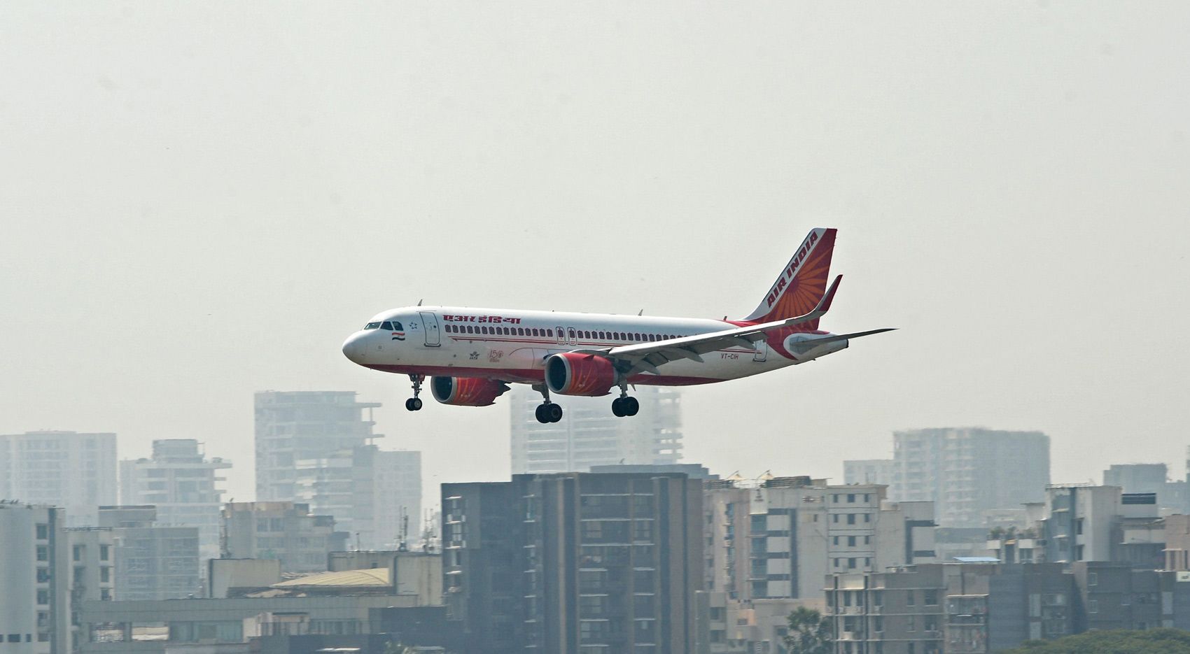 An Air India aircraft prepares to land at the Mumbai airport
