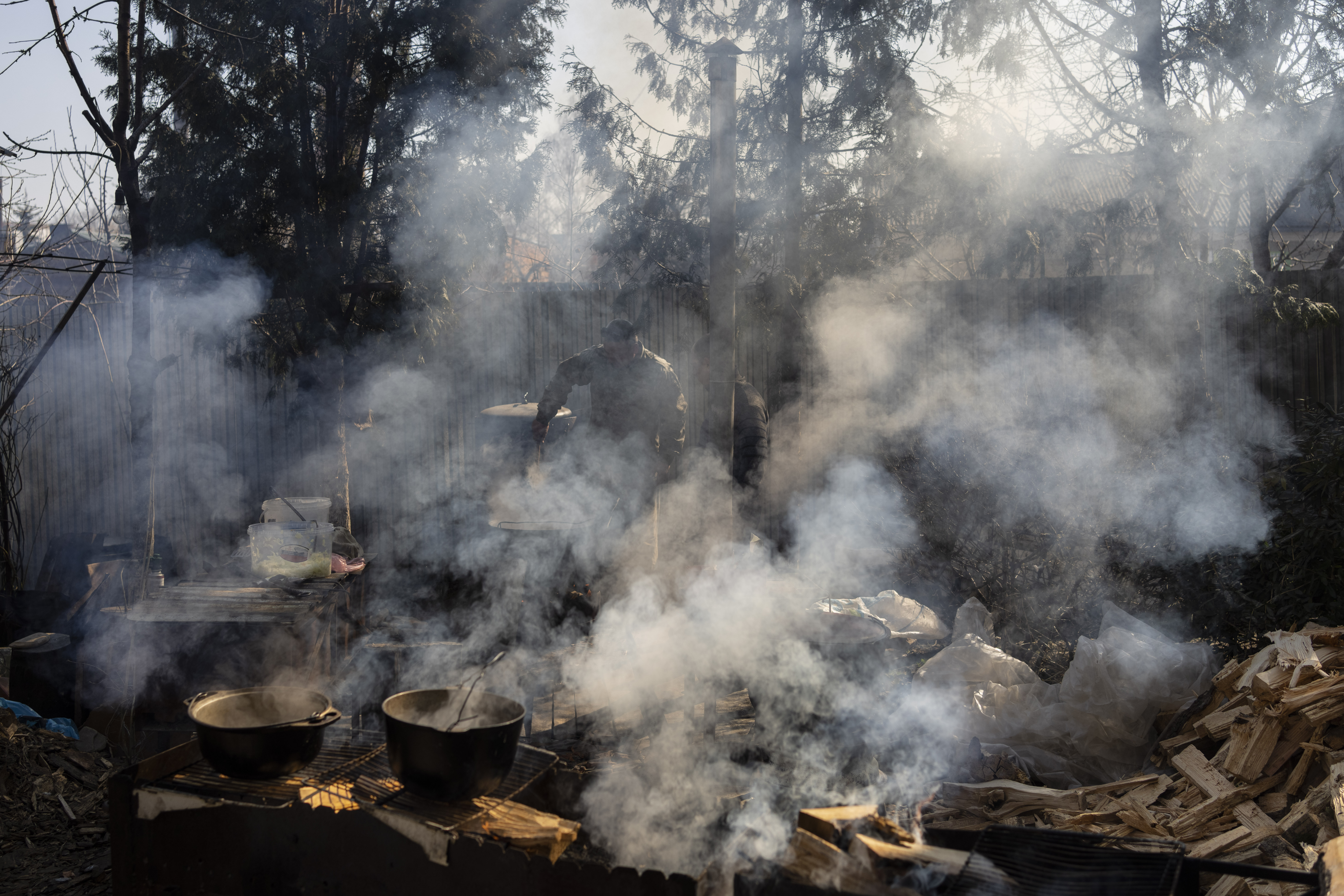Volunteers cook in the courtyard of a theatre in the city of Drohobych