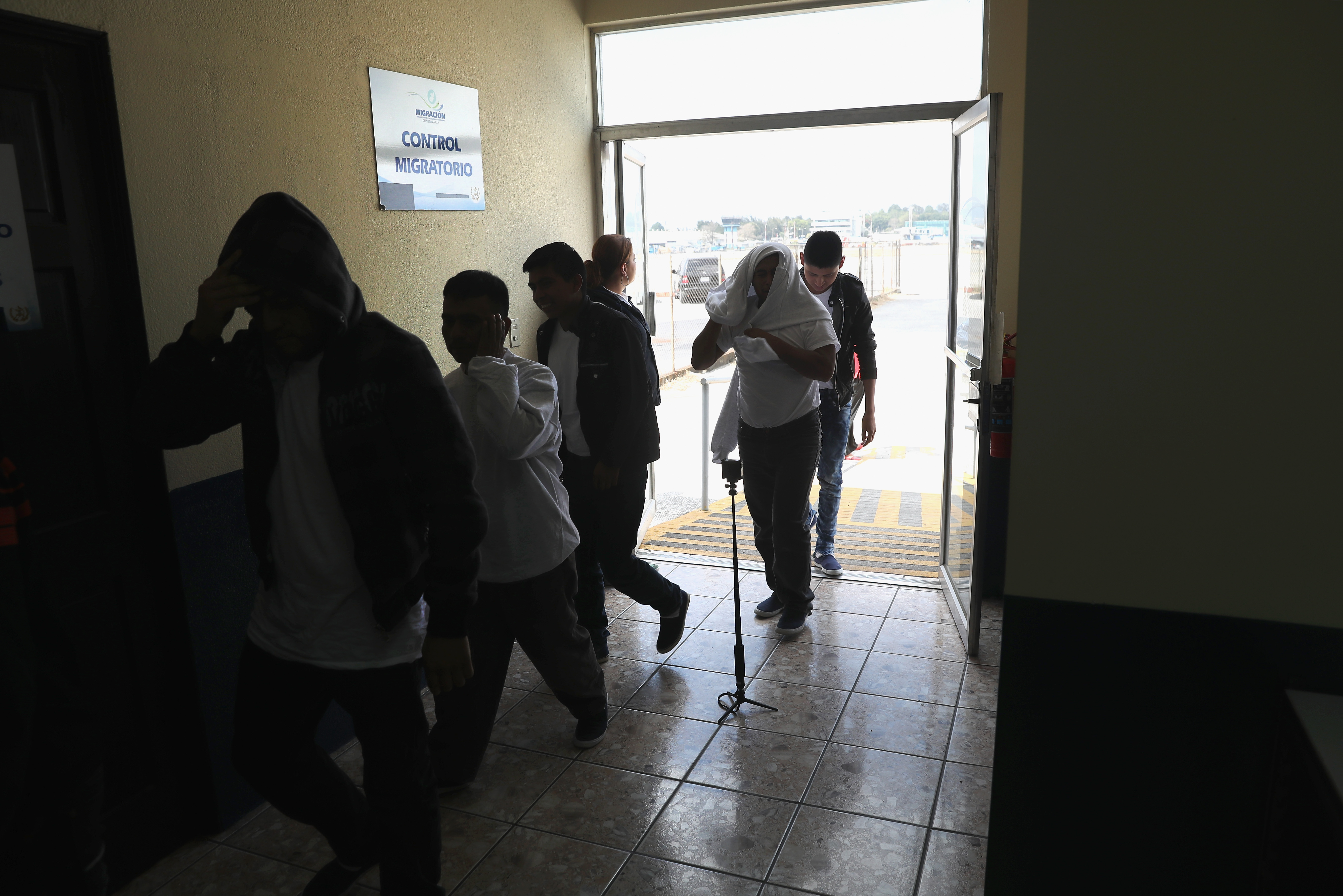 A photo of Guatemalan immigrants deported from the United States arriving on an ICE deportation flight.
