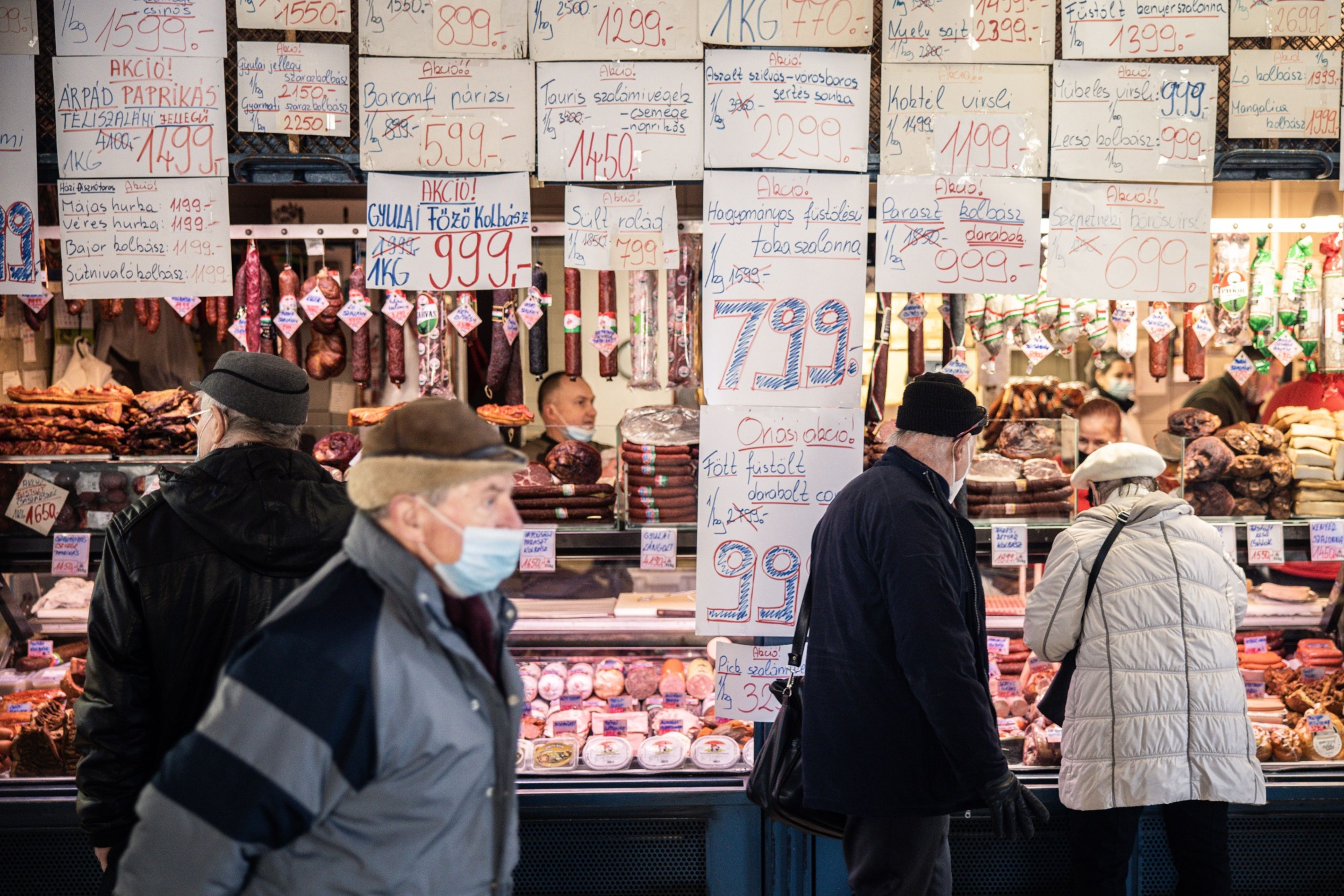 Hungarian price signs at a delicatessen counter