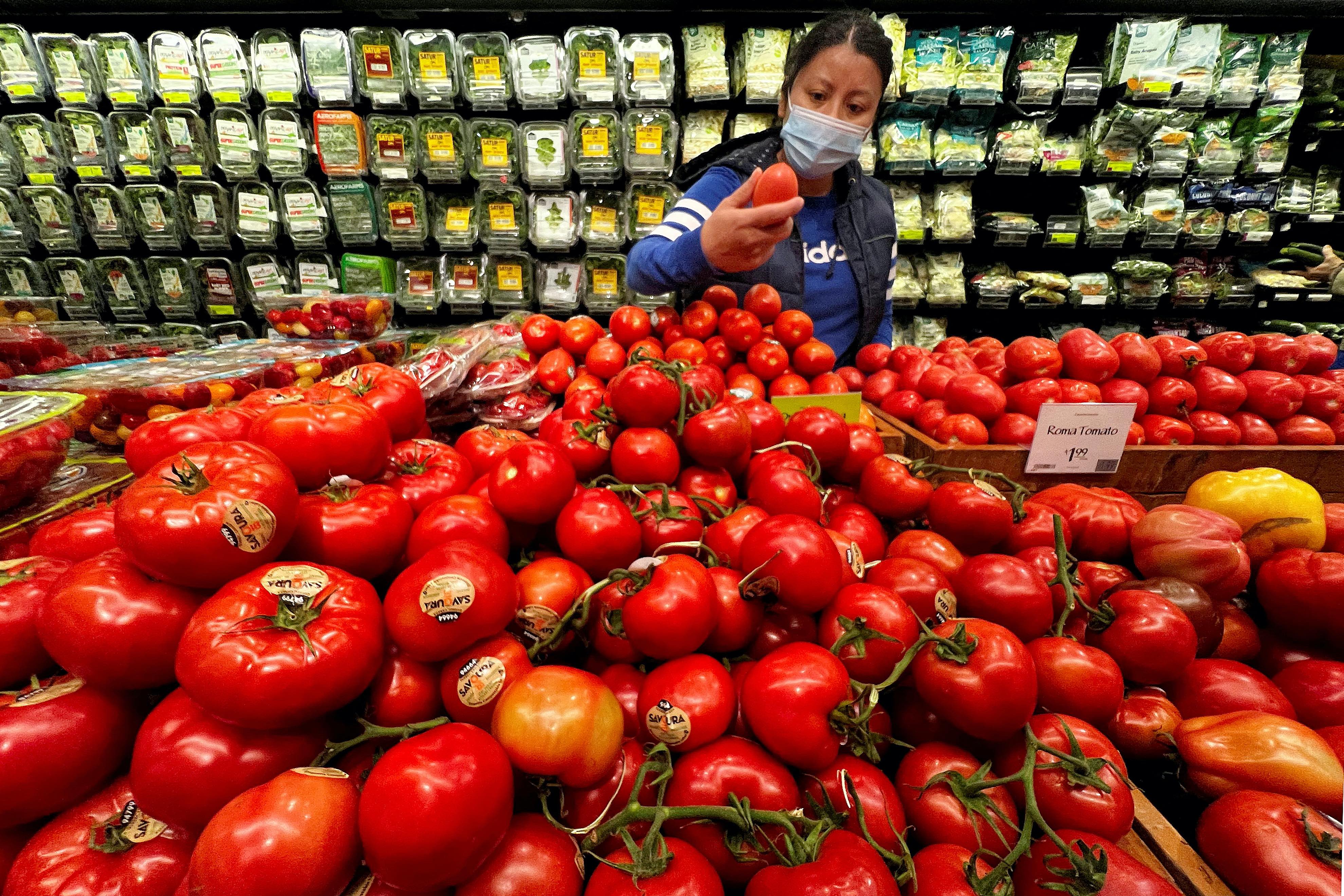 A person shops at a Whole Foods grocery store in the Manhattan borough of New York City, New York, U.S.