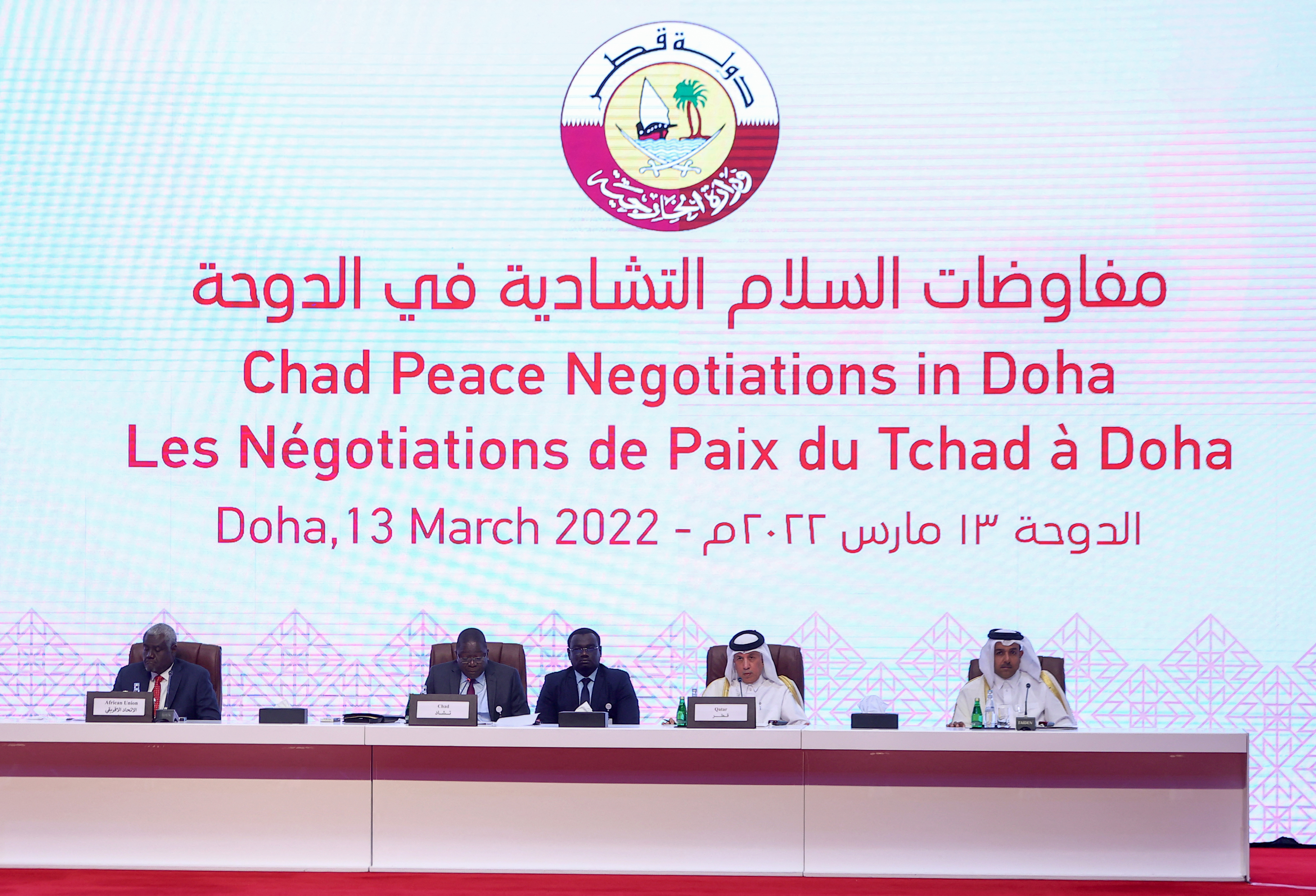 Participants take their seats on the podium as the Chad Peace Negotiations start in Qatar's capital Doha, on March 13