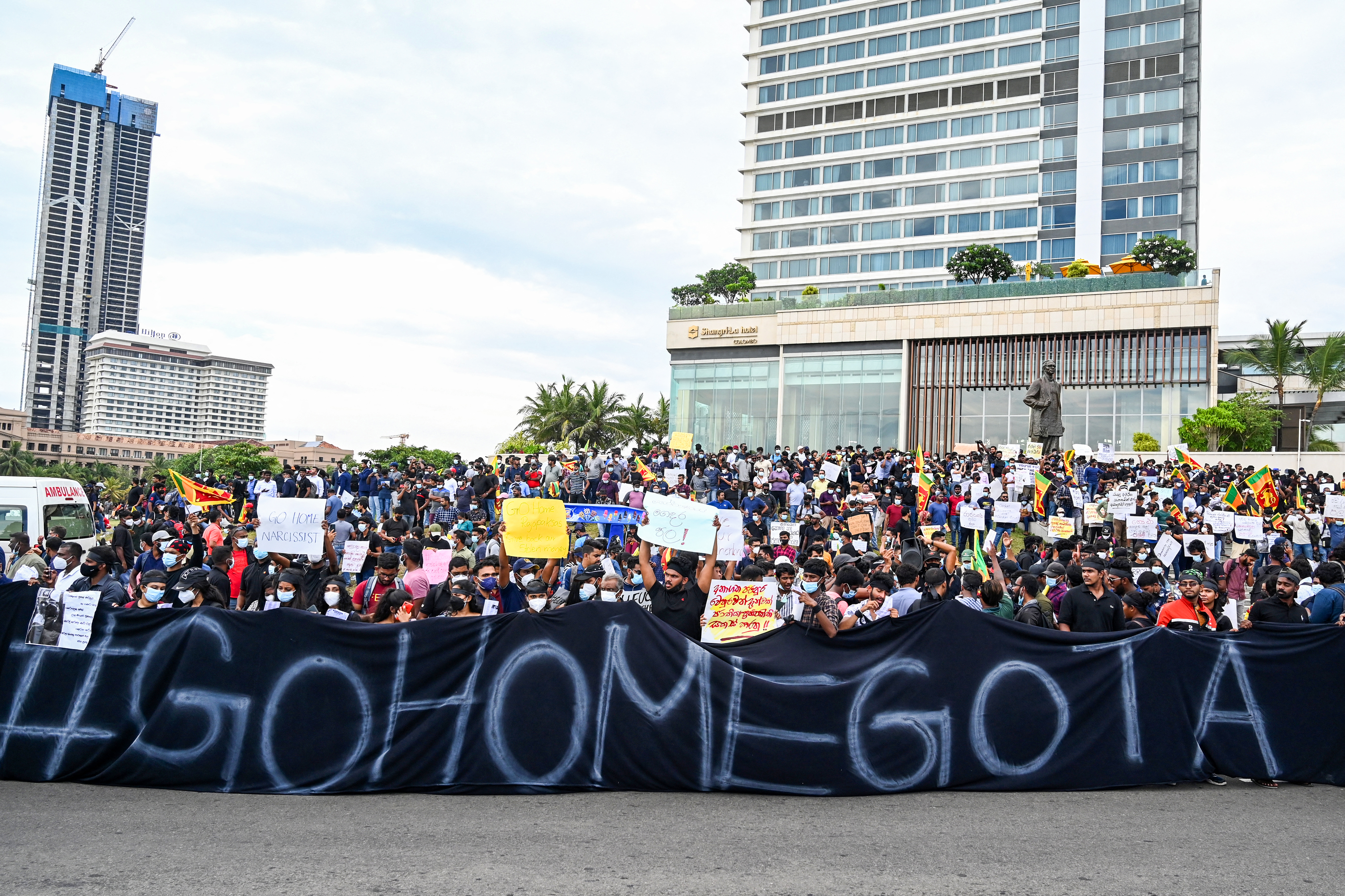 Protestors take part in a demonstration in Colombo on April 9, 2022. -