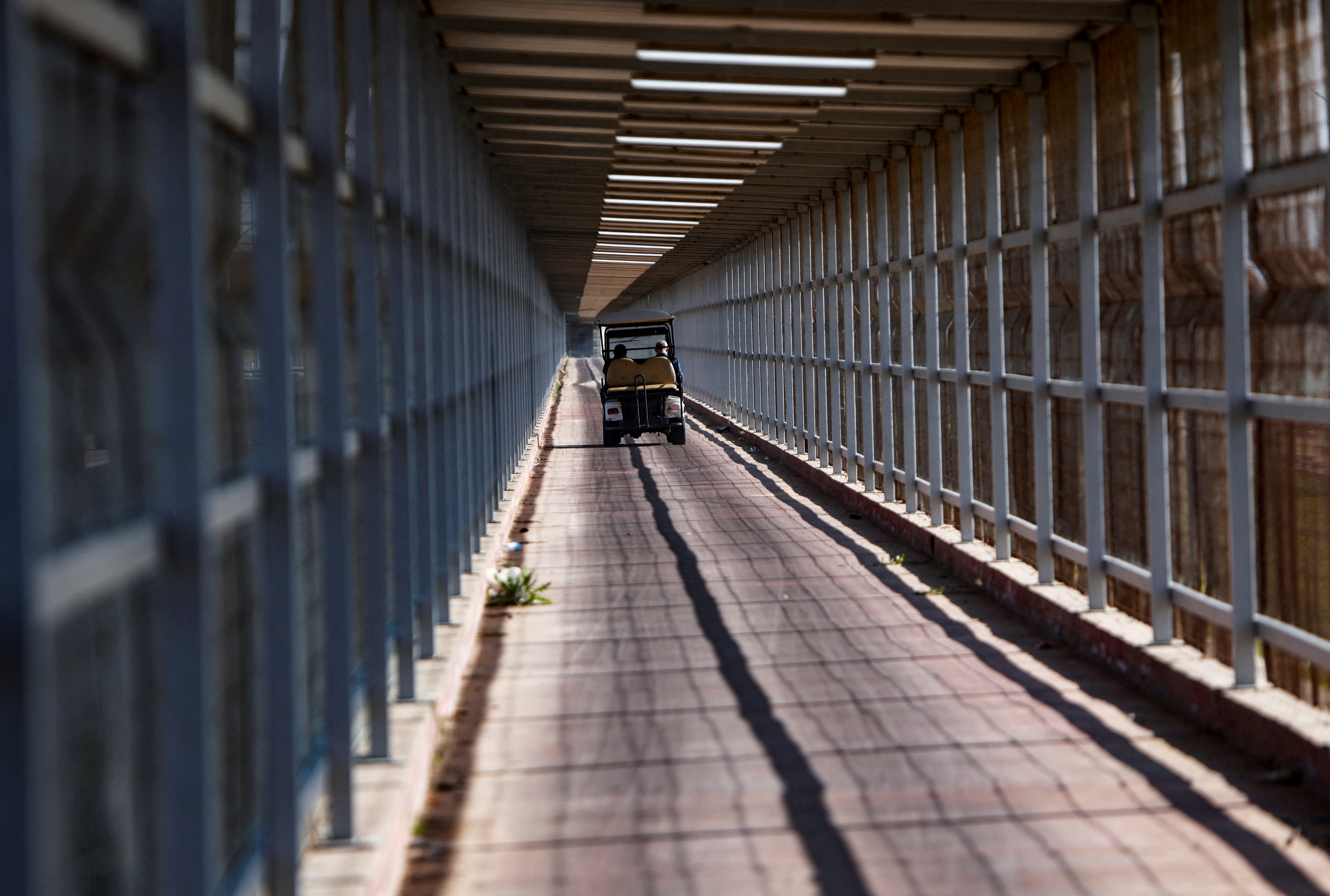 A Palestinian leaves the Gaza Strip in an auto rickshaw through Israeli Erez crossing, in the northern Gaza Strip