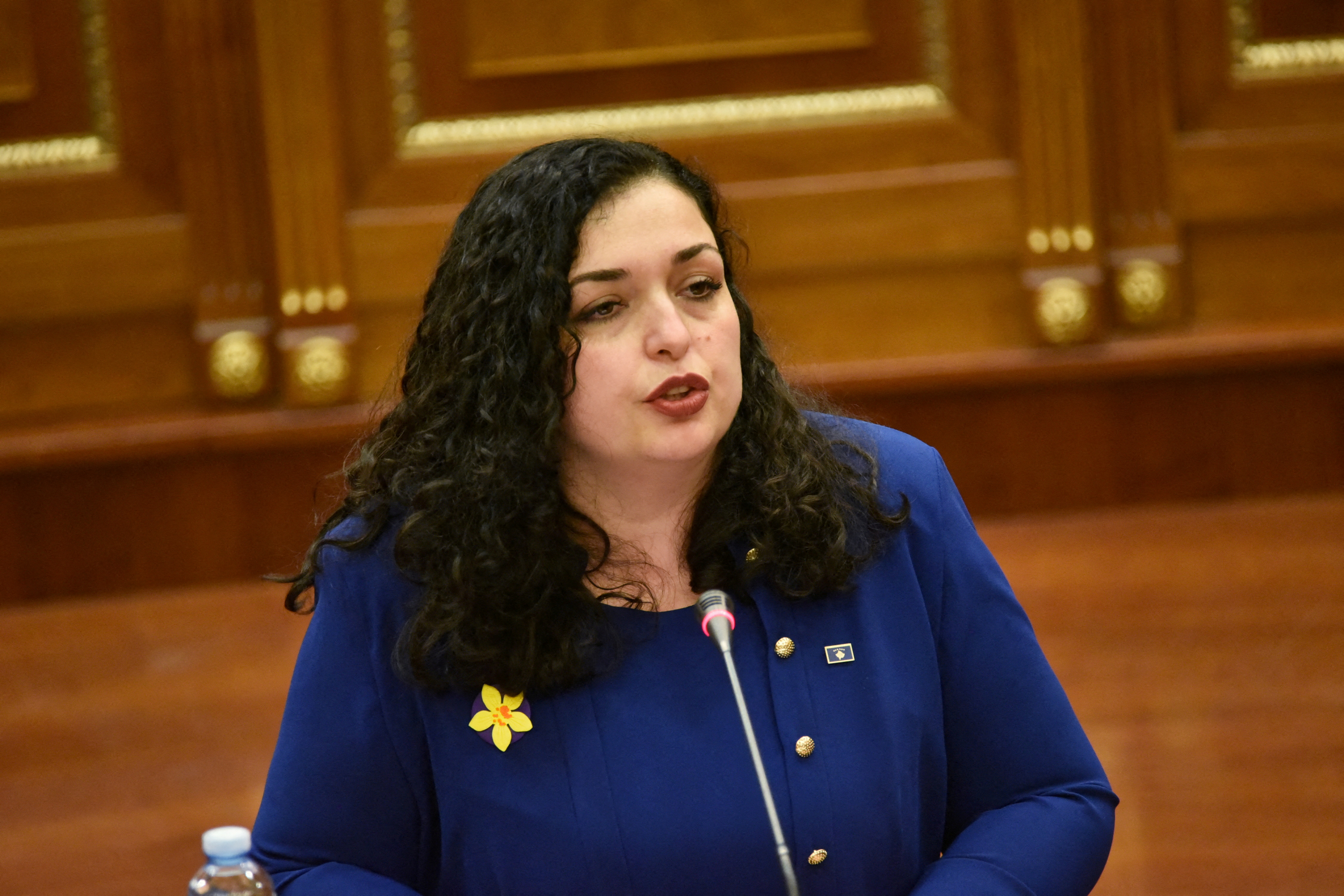 The newly elected Kosovo President Vjosa Osmani addresses members of the parliament during the swearing-in ceremony in Pristina, Kosovo