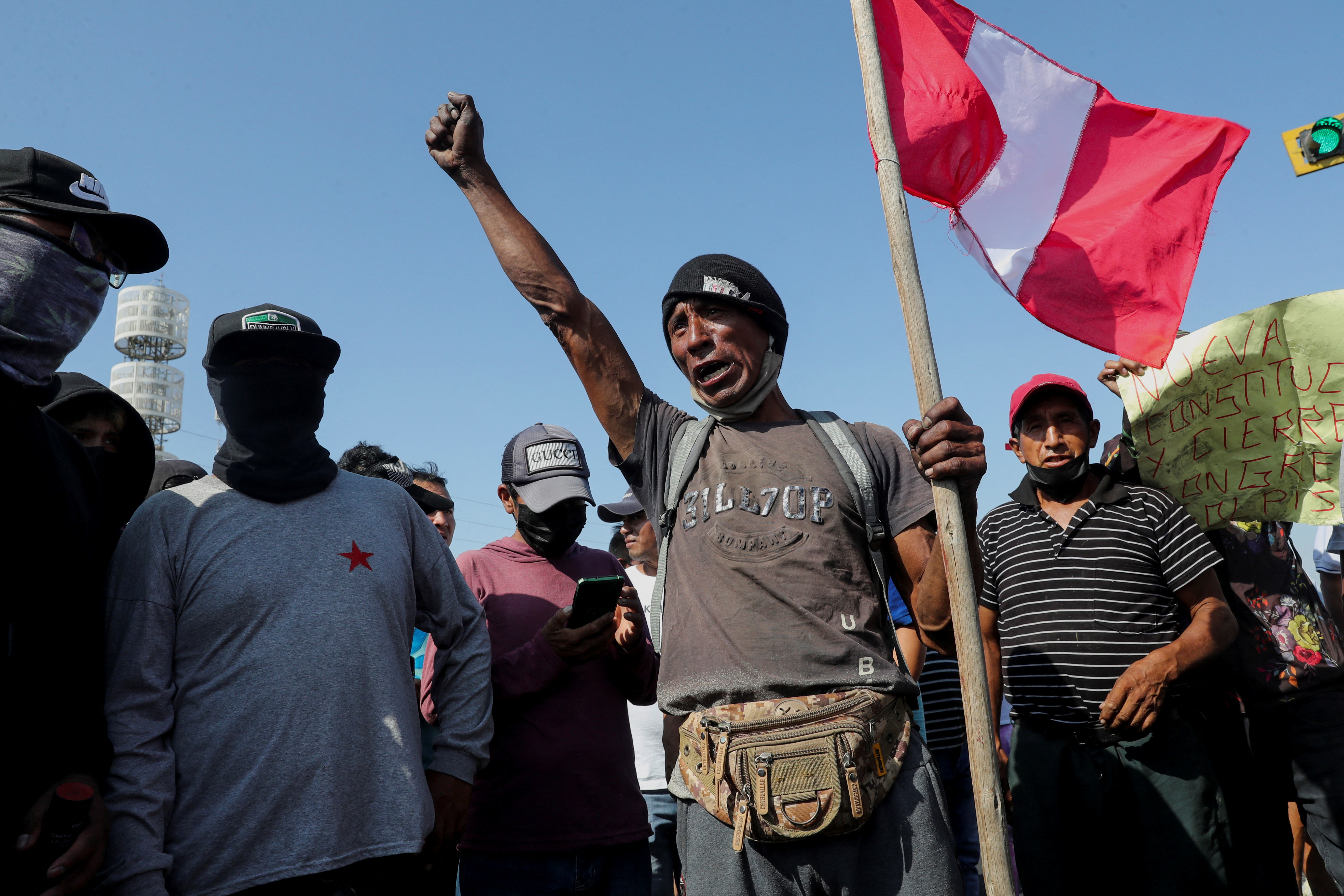 Demonstrators block a highway to Lima during a national transportation strike against gas prices and toll road rates, in Ica, Peru April 4, 2022