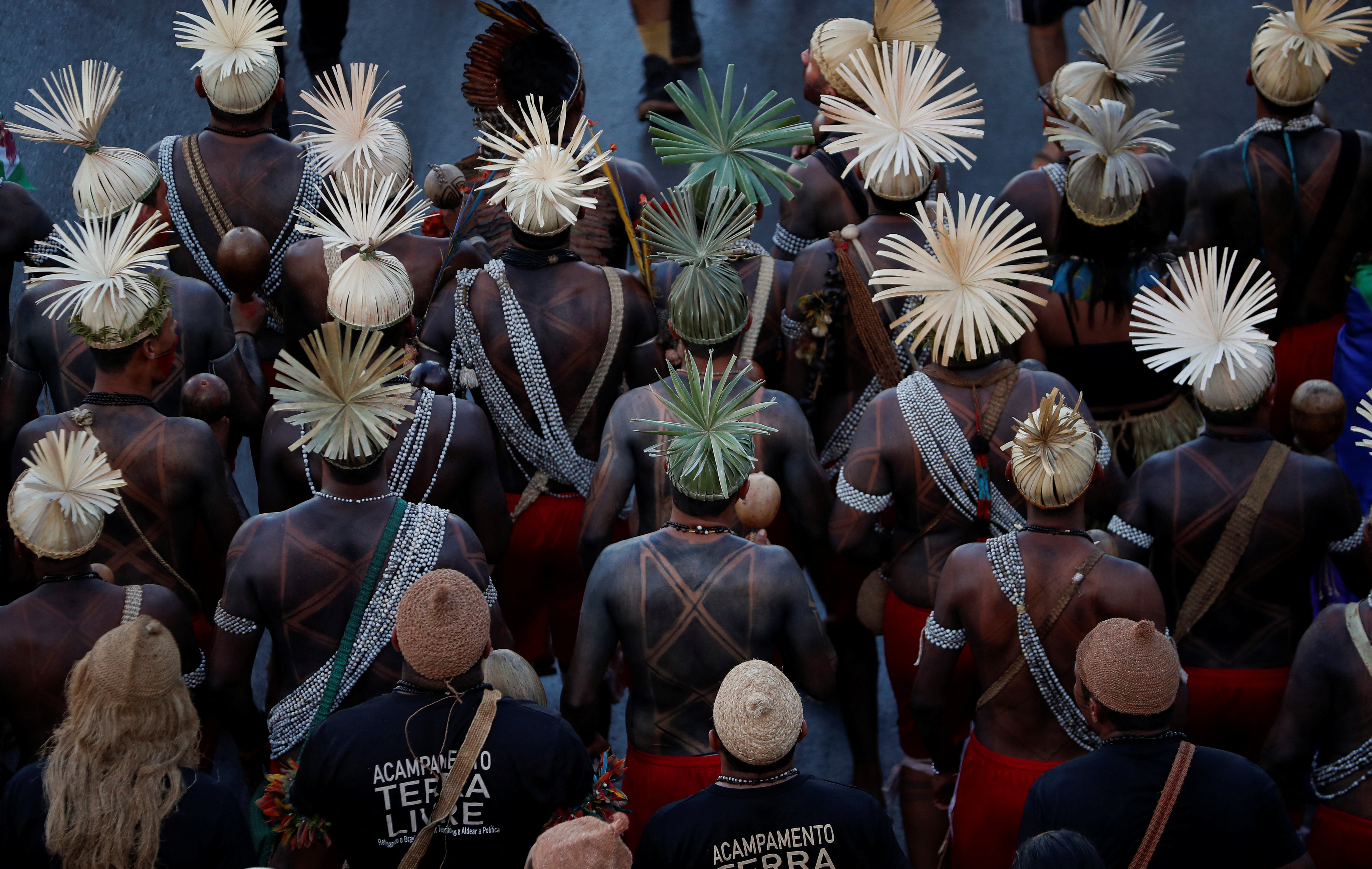 Indigenous people march during a protest against Brazil's President