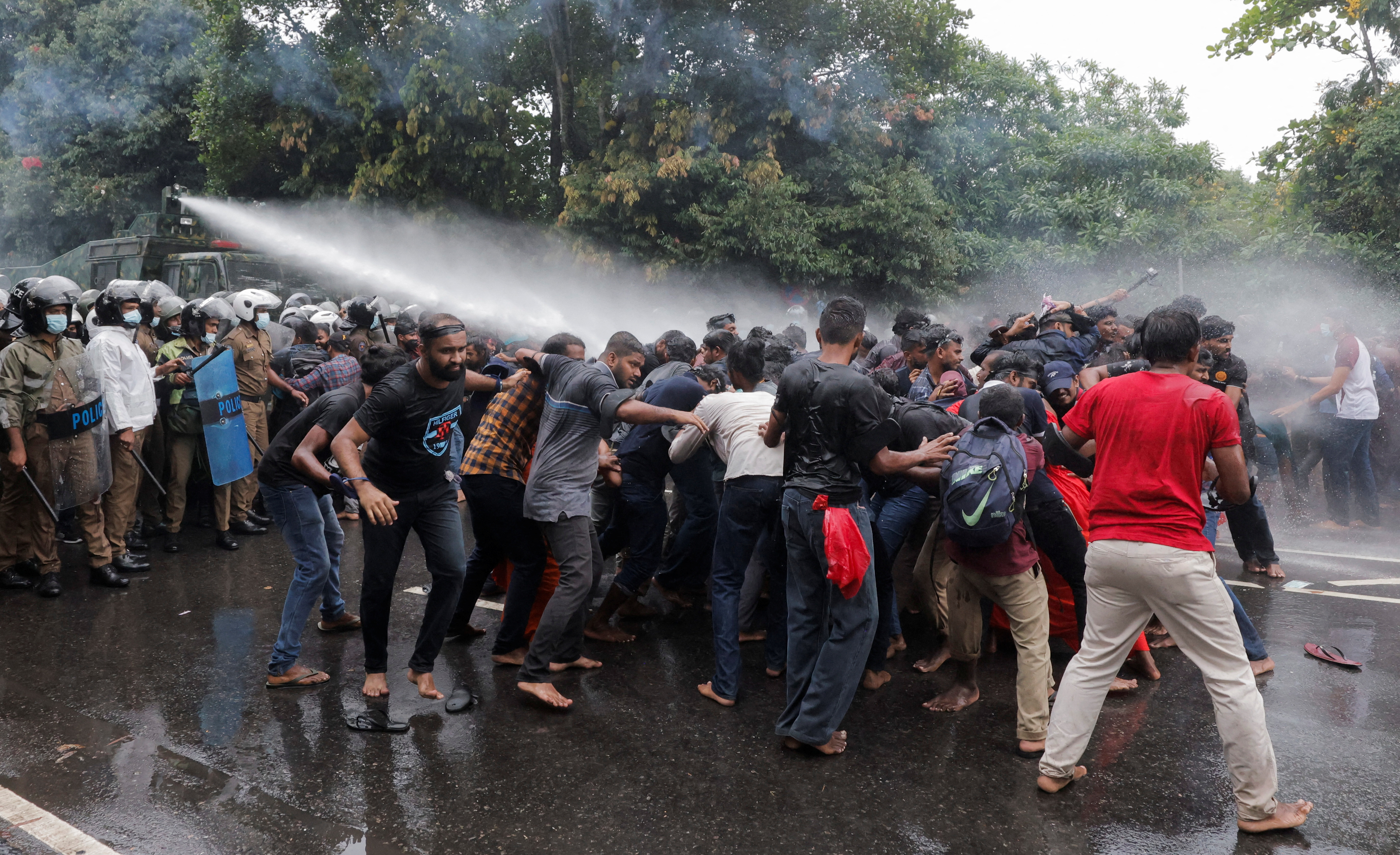 Police use water cannon on demonstrators during a protest against Sri Lankan President Gotabaya Rajapaksa near the parliament, amid the country's economic crisis in Colombo, Sri Lanka, April 8, 2022.