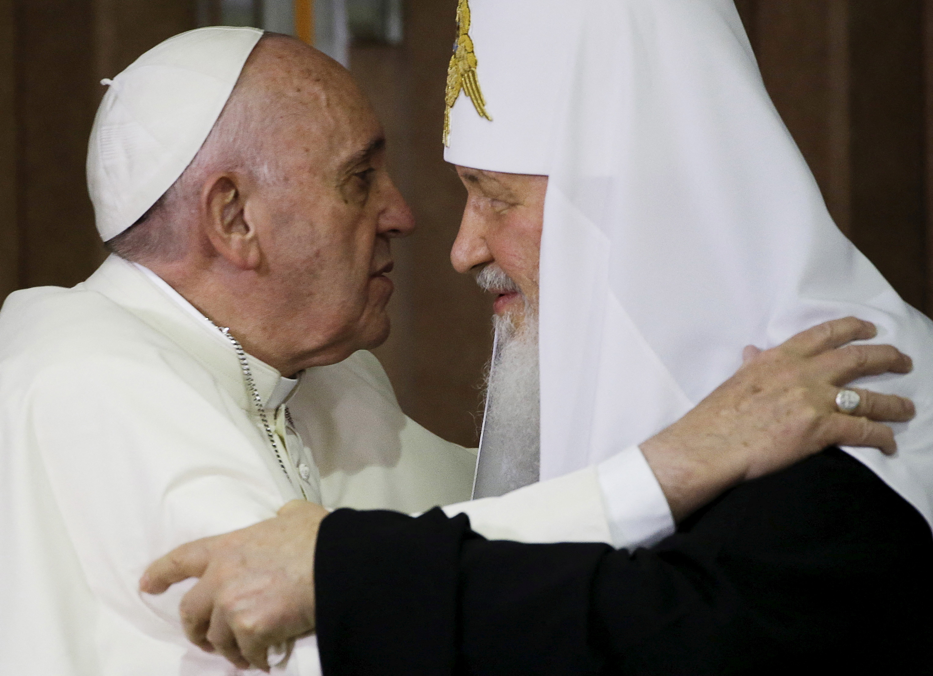 Pope Francis (L) embraces Russian Orthodox Patriarch Kirill after signing a joint declaration on religious unity at the Jose Marti International airport in Havana, Cuba, Friday, February 12, 2016.