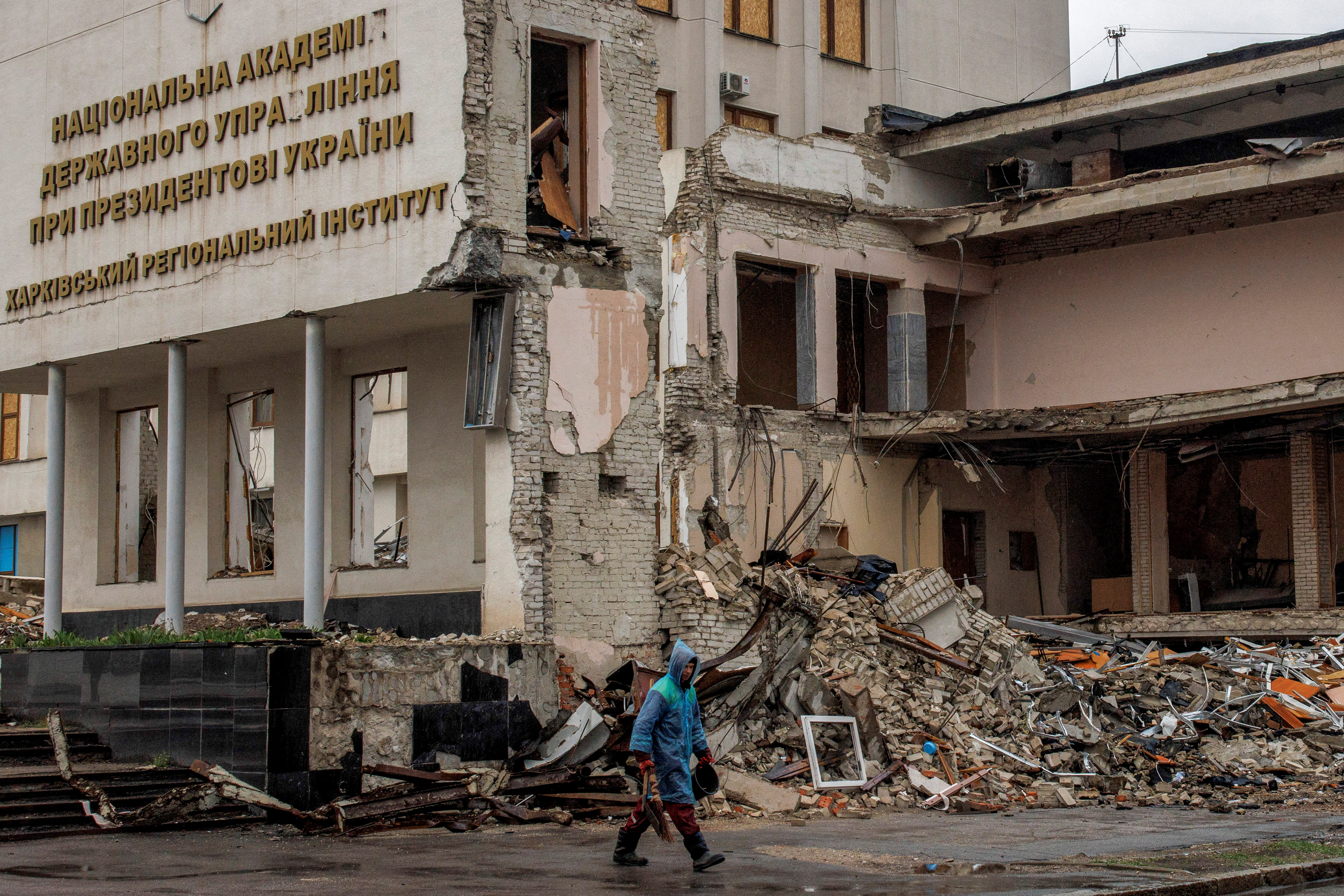 A man walks past the Kharkiv Regional Institute.