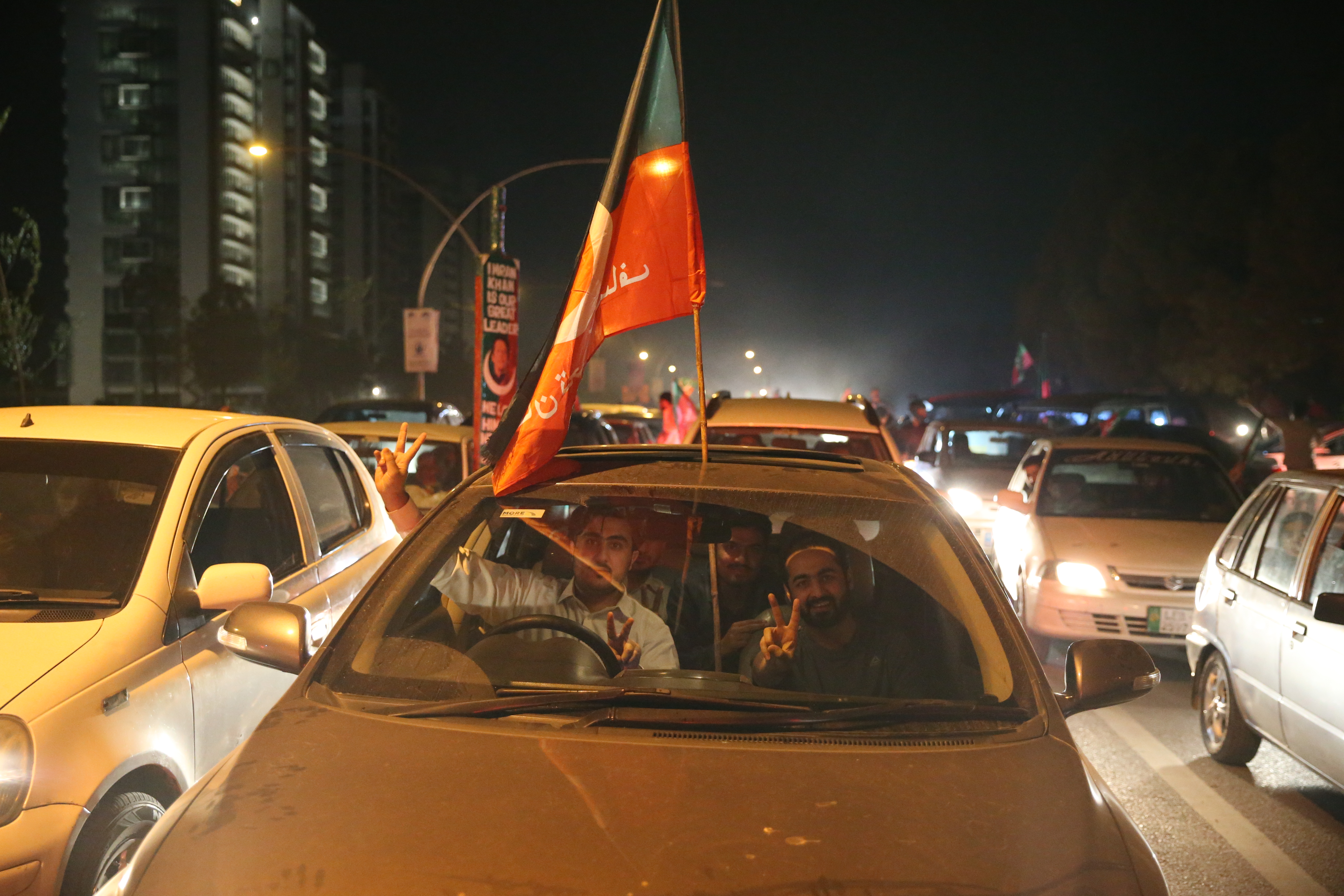 Supporters of Pakistan Tehreek-e-Insaf (PTI) party