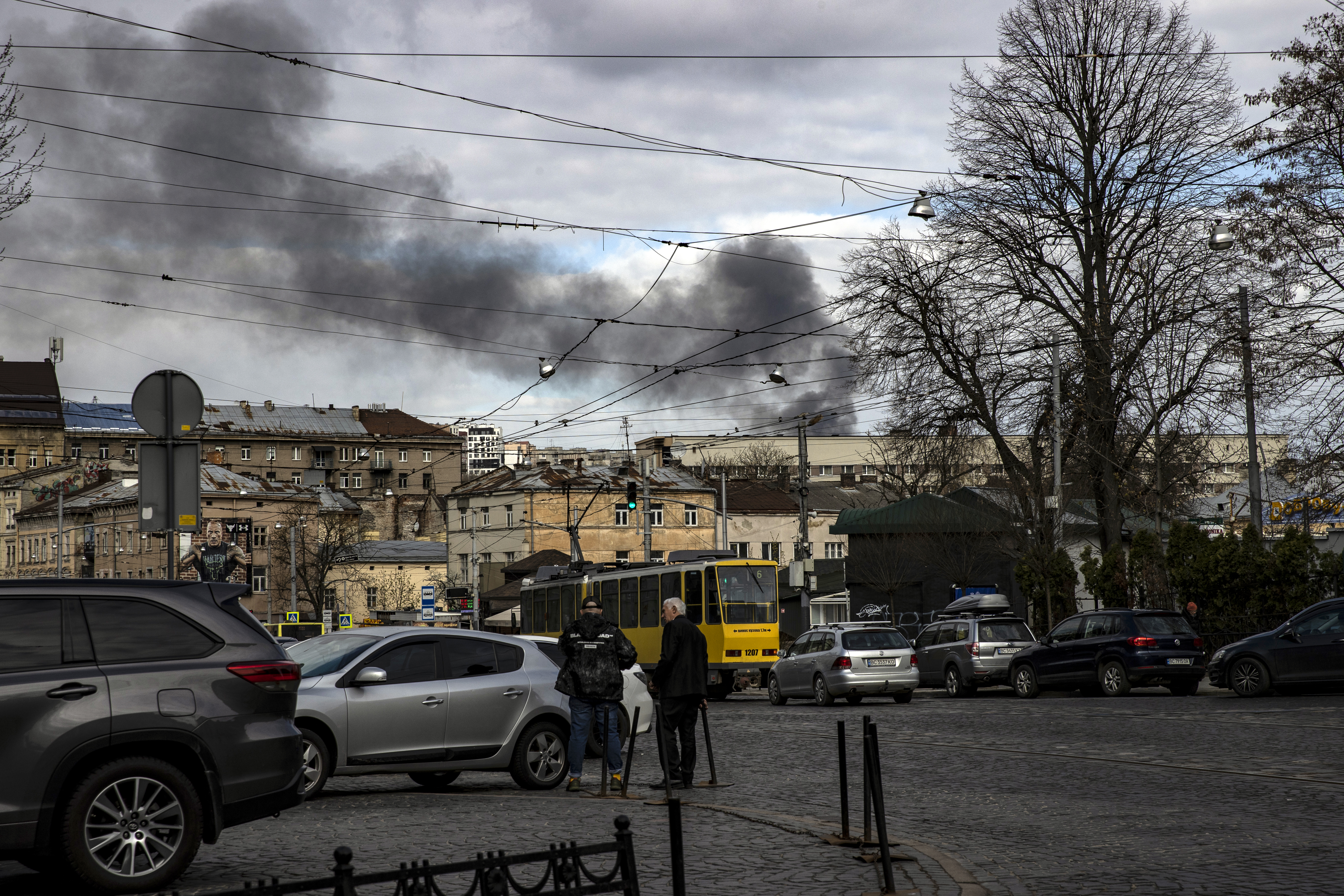 Smoke is seen in Lviv after Russian missile strikes in the city
