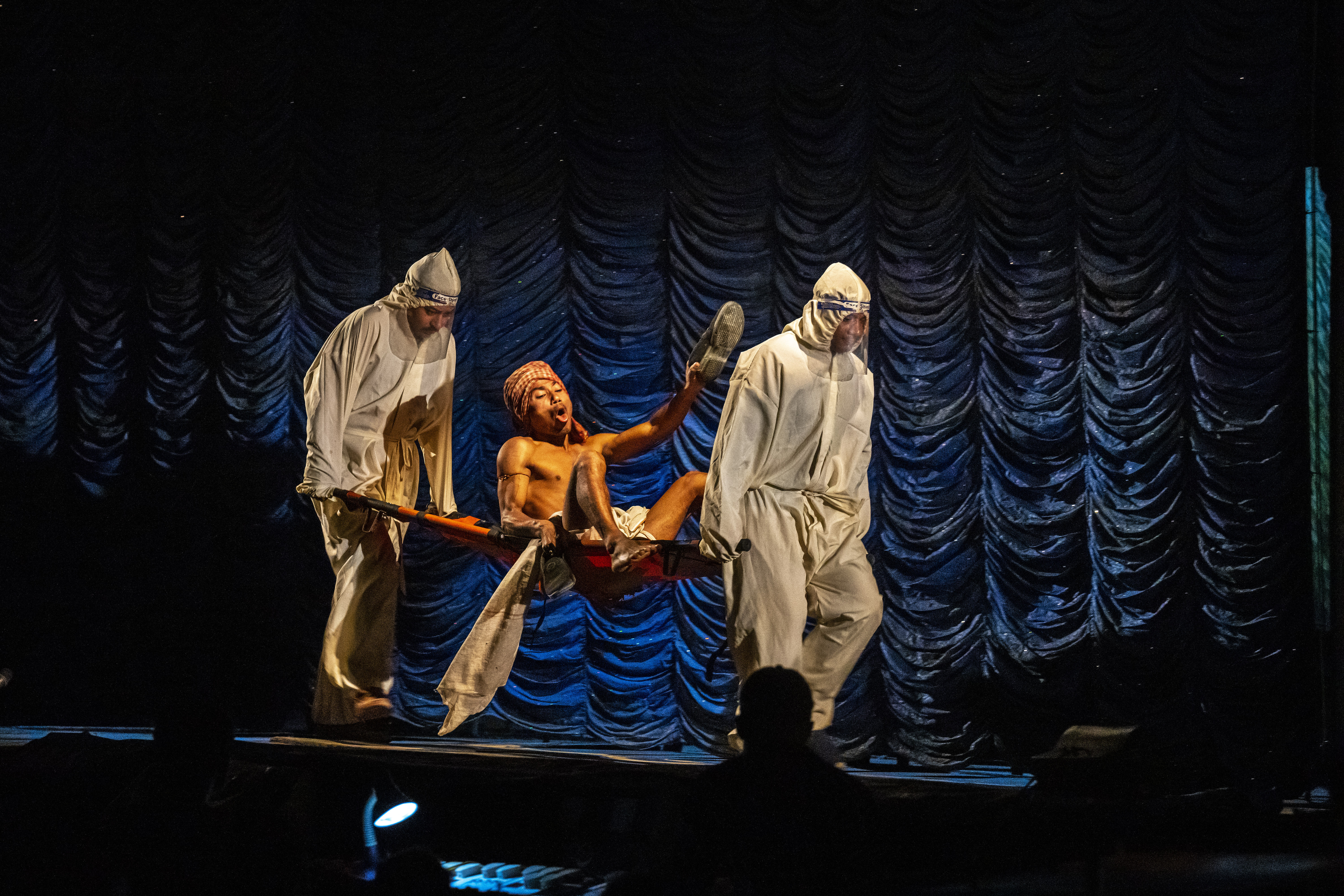 Actors of Awahan mobile theater group perform at Xetali village east of Guwahati