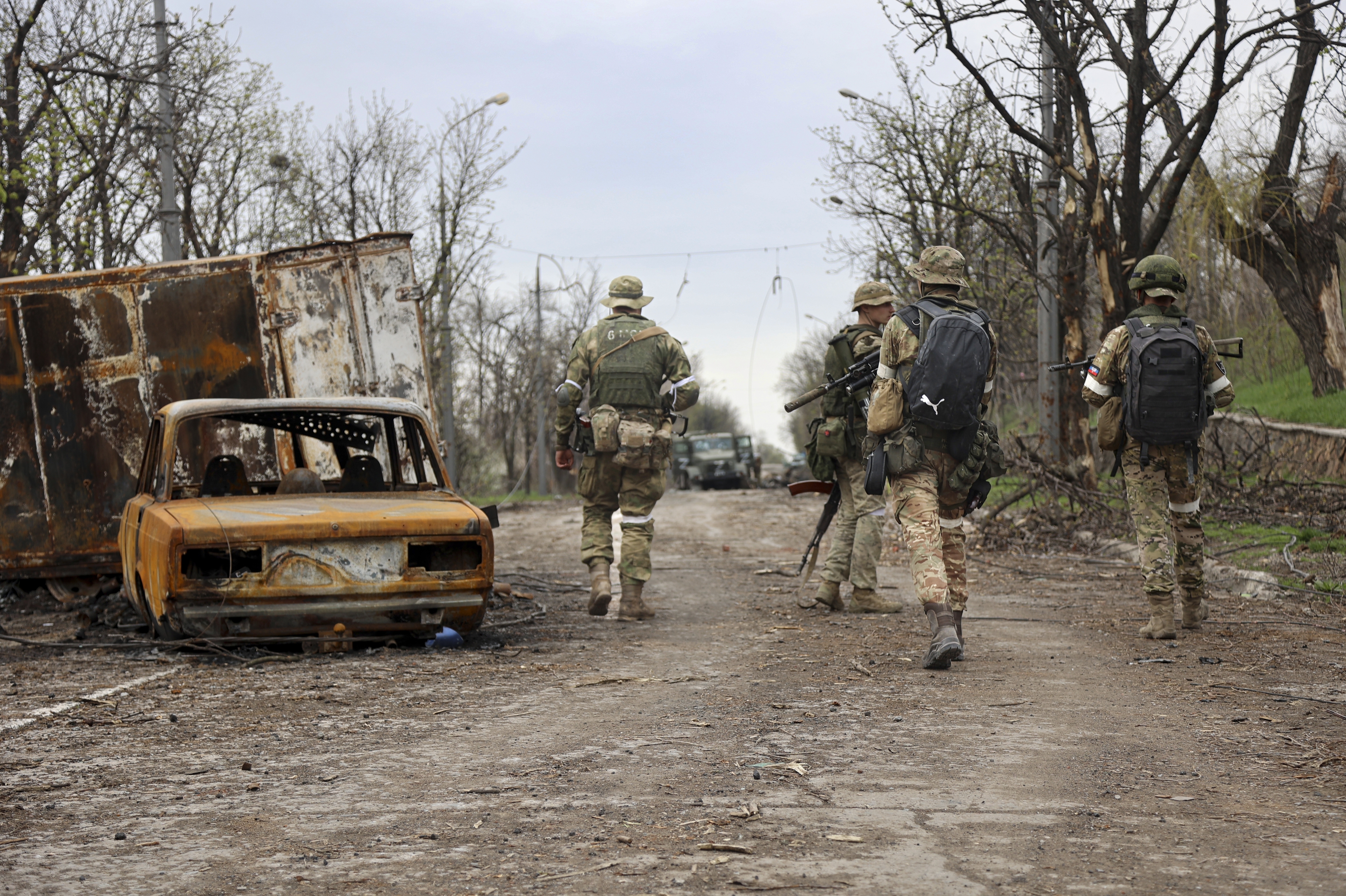 Russia-backed separatist forces are seen on patrol in Mariupol