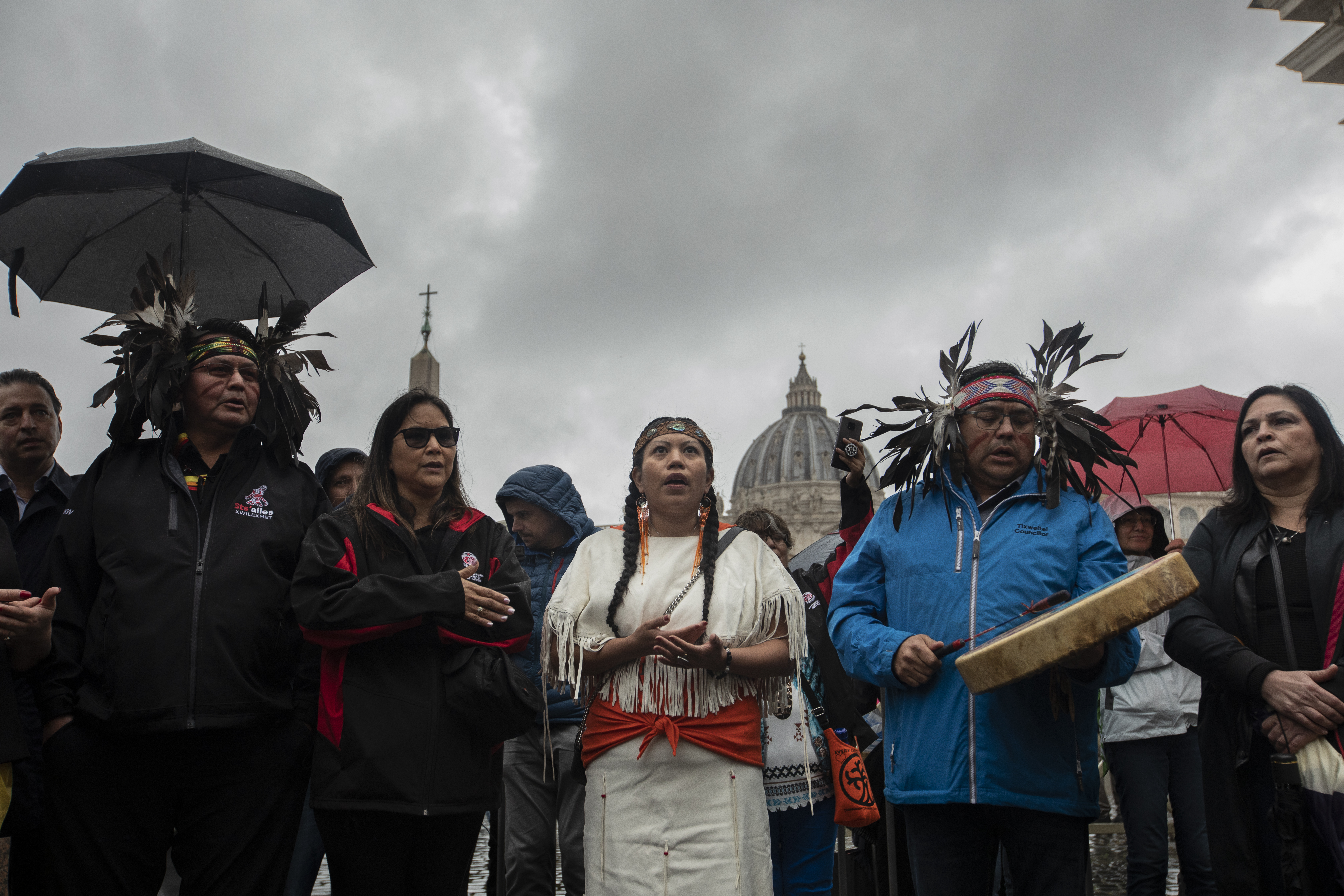 A photo of Laurelei Williams singing with a group of people.