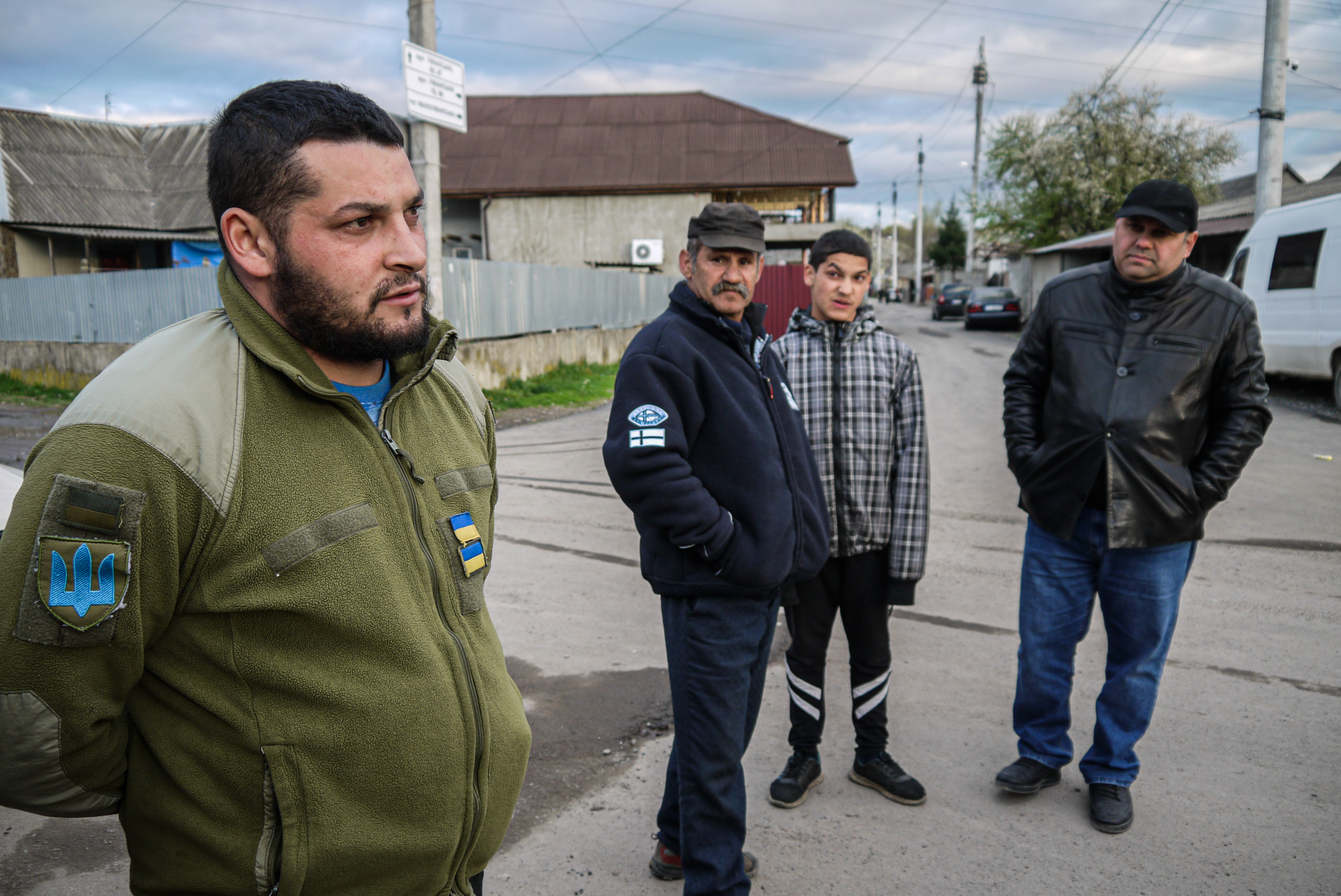 506.jpg: Viktor Ilchak (left), a wounded tank mechanic, says that at the front there are no nationalities;"we are all friends".
