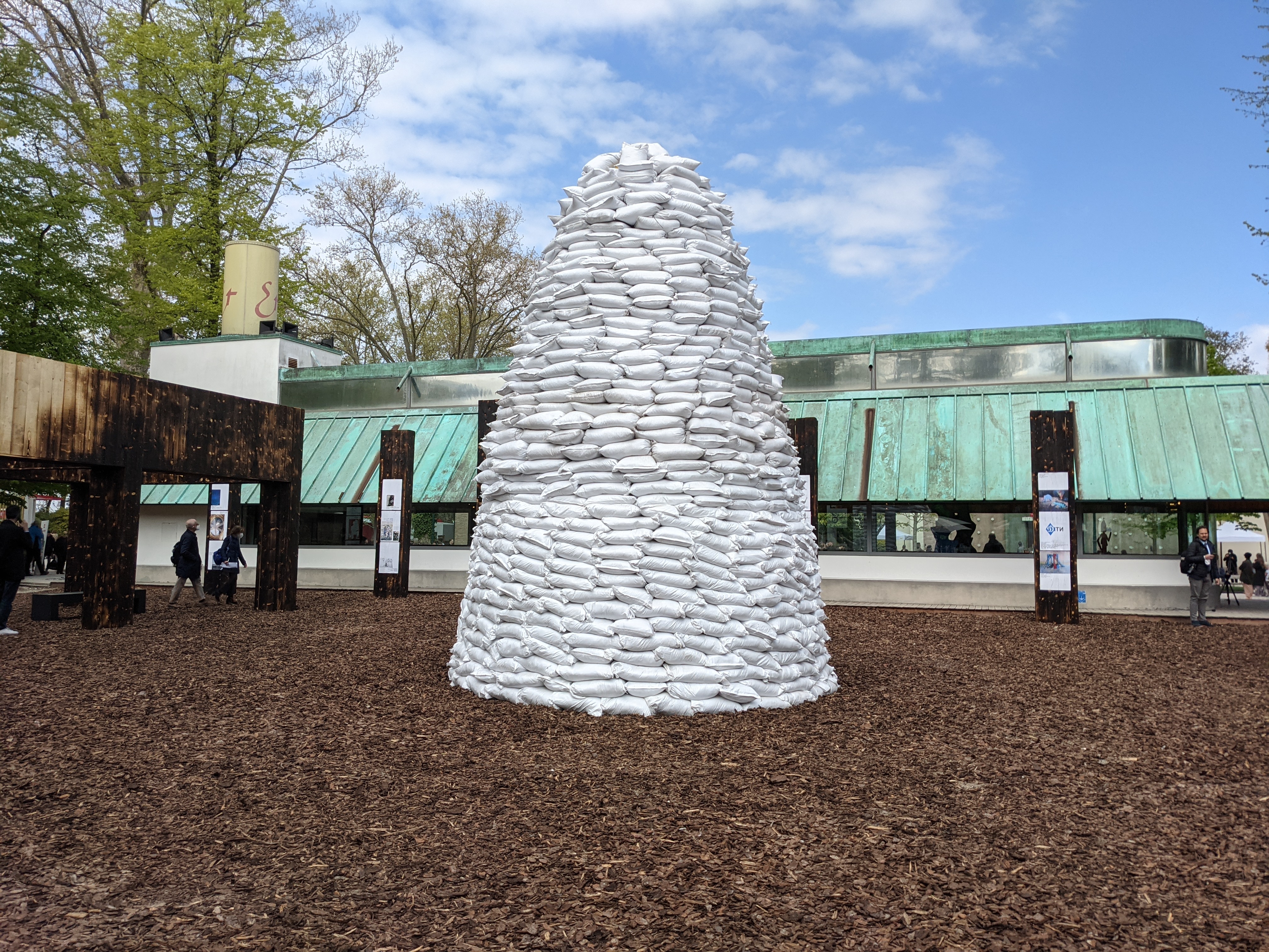A pile of sandbags stands at the centre of the Piazza Ucraina, which evokes attempts to protect Ukranian national monuments in Kyiv and other cities [Ruairi Casey/Al Jazeera]